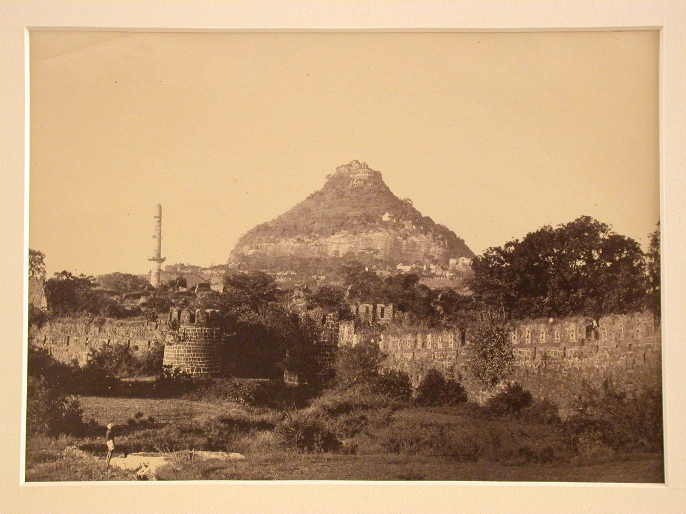 View of Daulatabad Fort with the Chand Minar (also known as the Pillar of Victory) on the left and defensive walls in the foreground, Daulatabad, India