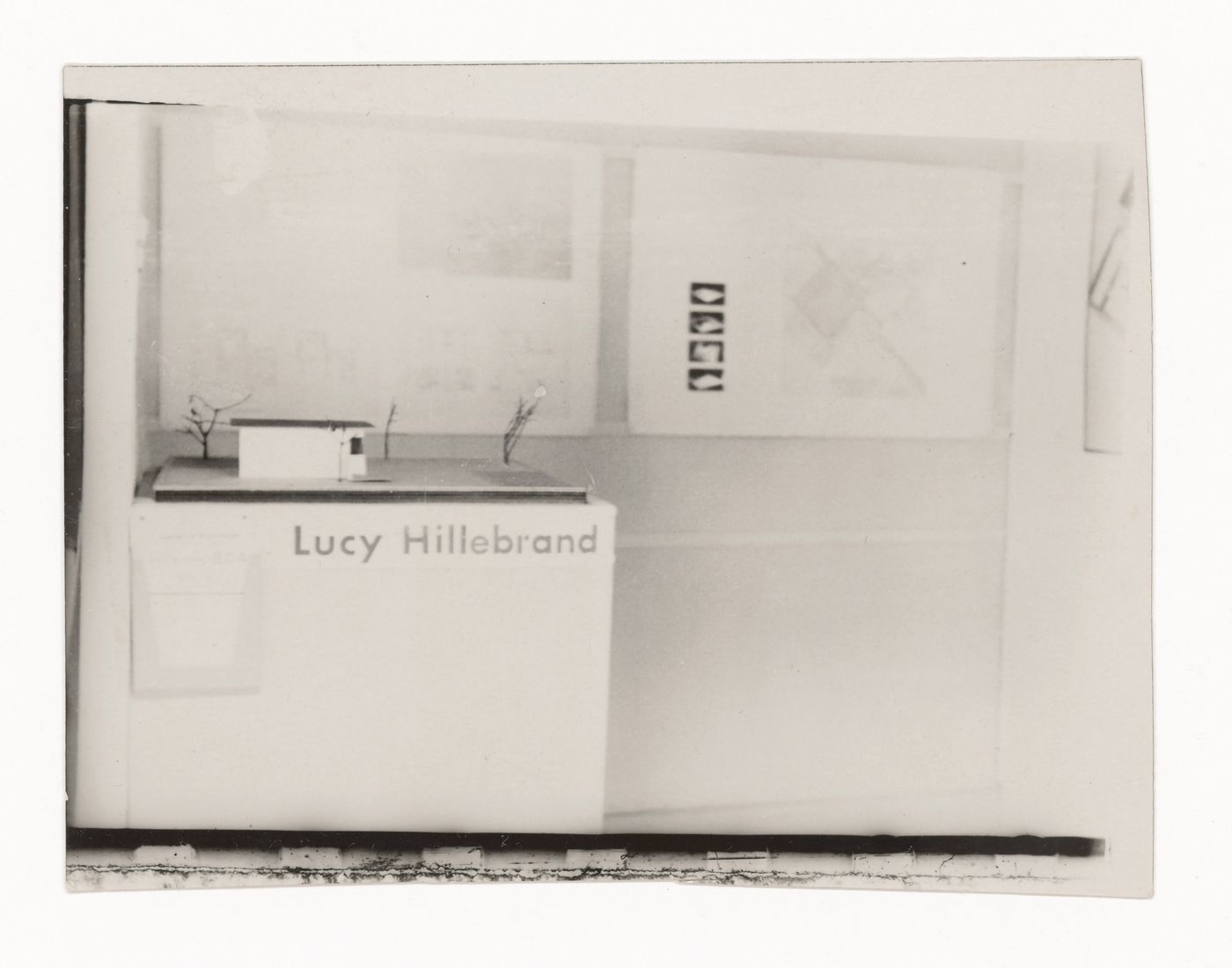 View of small-scale model and plans of unidentified house by Lucy Hillebrand