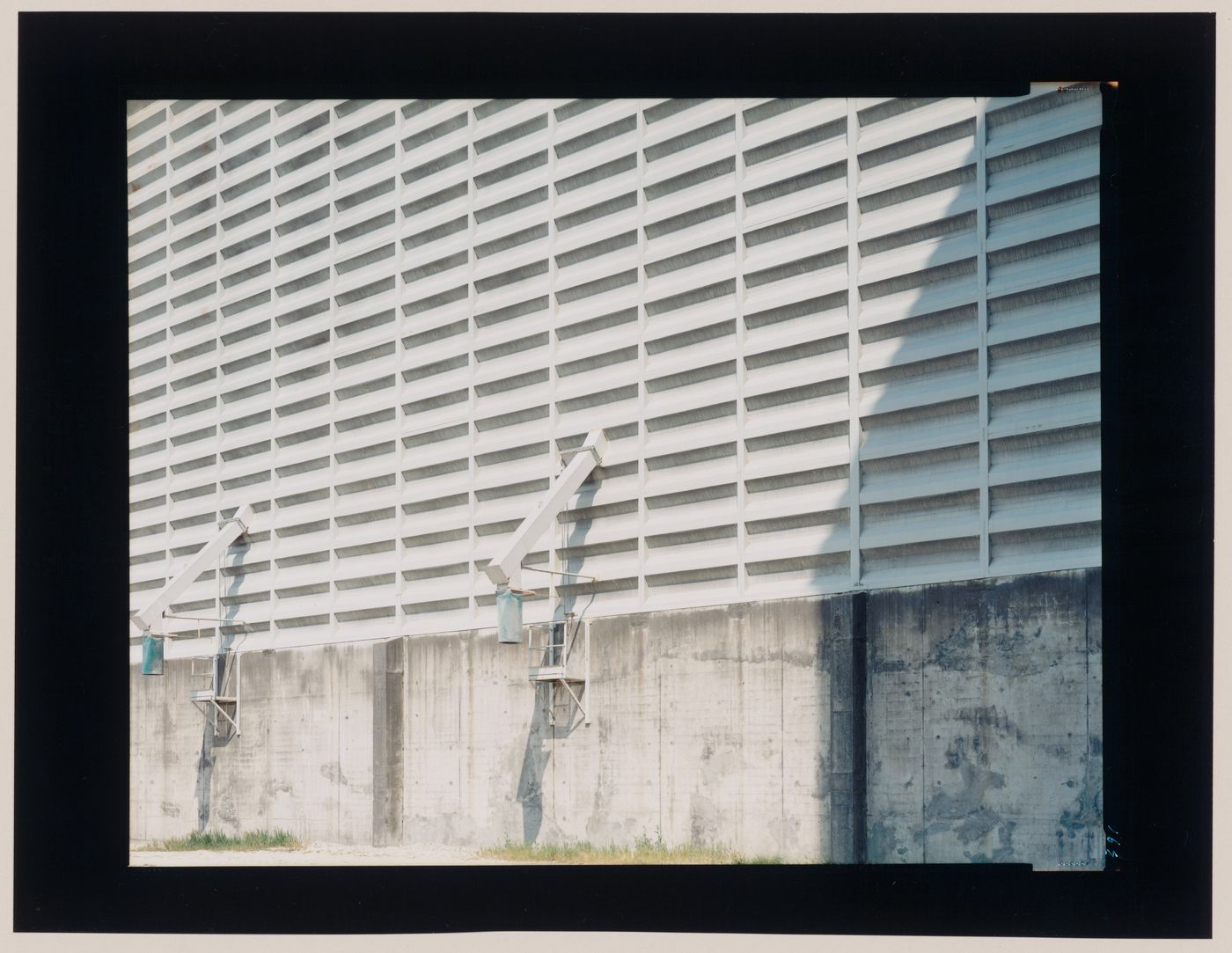 View of the wall of an agricultural building showing two chutes, Senlis, France (from the series "In between cities")