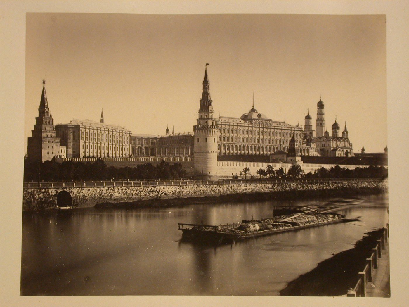 View of the Kremlin from across the Moskva River with the Vodovzvodnaya Tower (Water-pumping Tower) in the foreground, Moscow