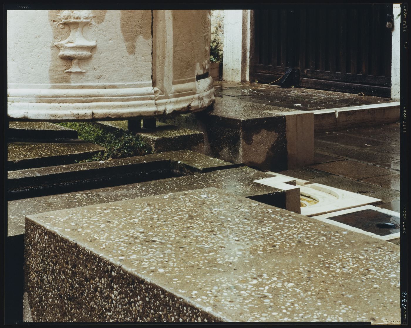 Partial view of a stone basin, the garden, Palazzo Querini Stampalia, Venice, Italy