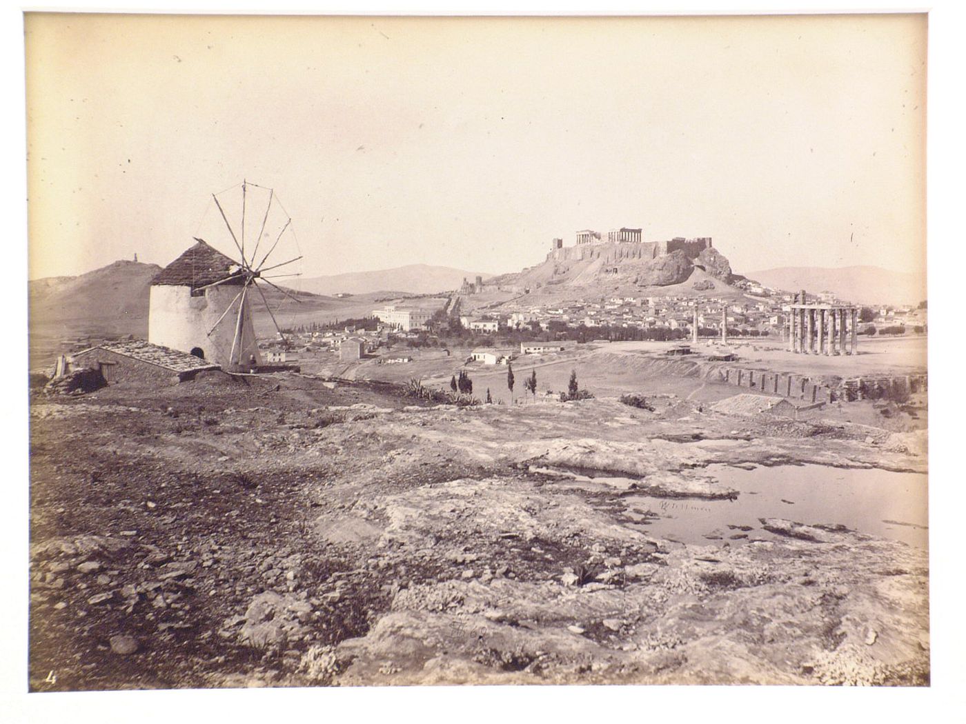 IV. The Acropolis from the Illyus. Ruins of the Temple of Jupiter Olympus in the middle distance.