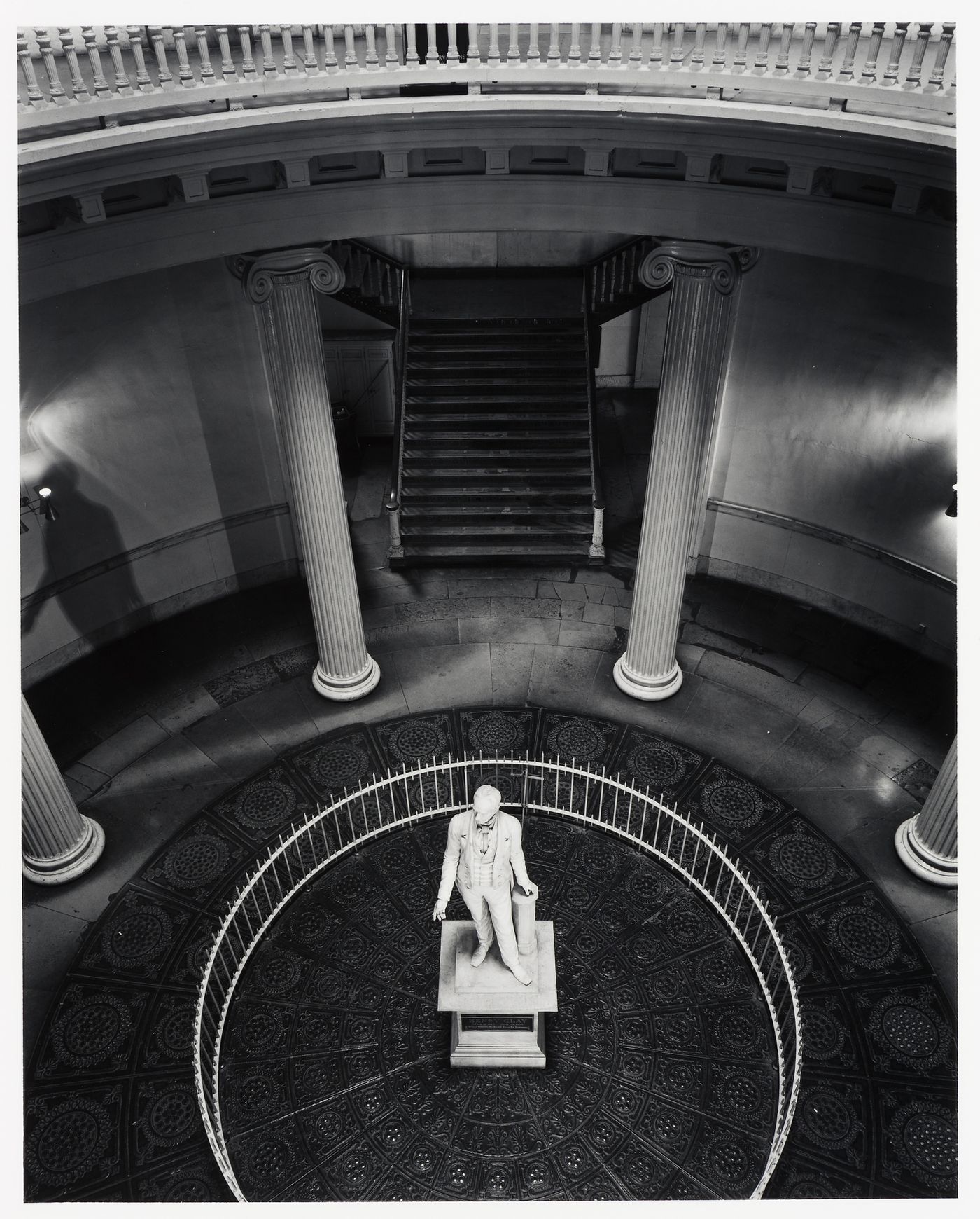 Overhead view of the rotunda of the Jefferson County Courthouse showing a statue of Henry Clay, columns and a staircase, Louisville, Kentucky, United States