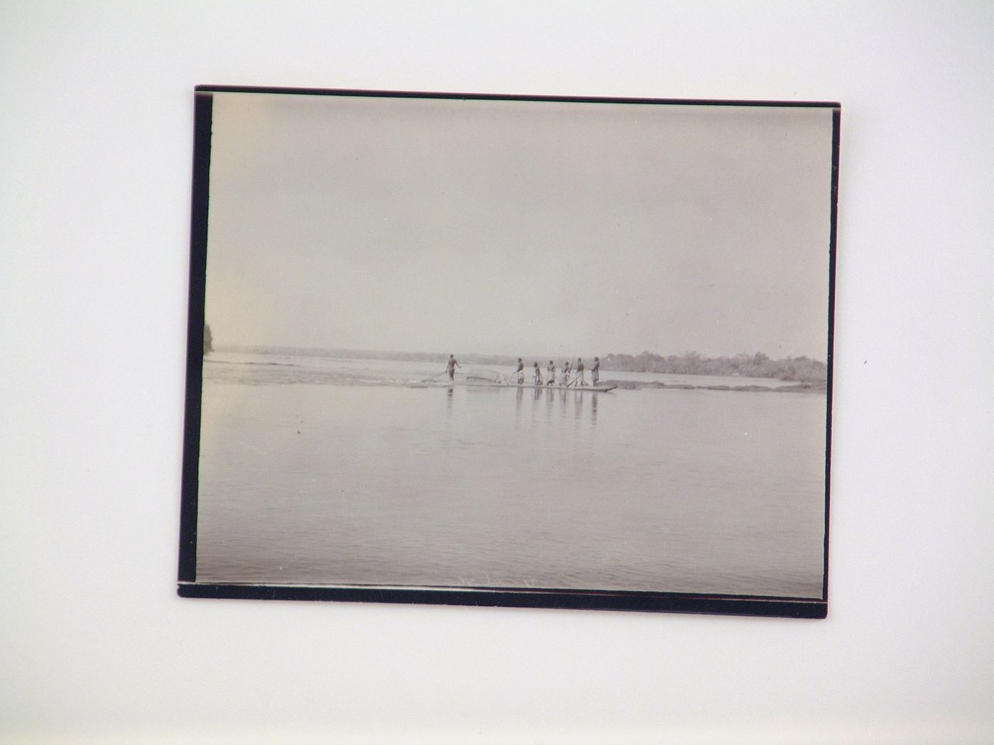 View of a group of people in mokoro (wooden dugout canoe) boats, Zambezi River