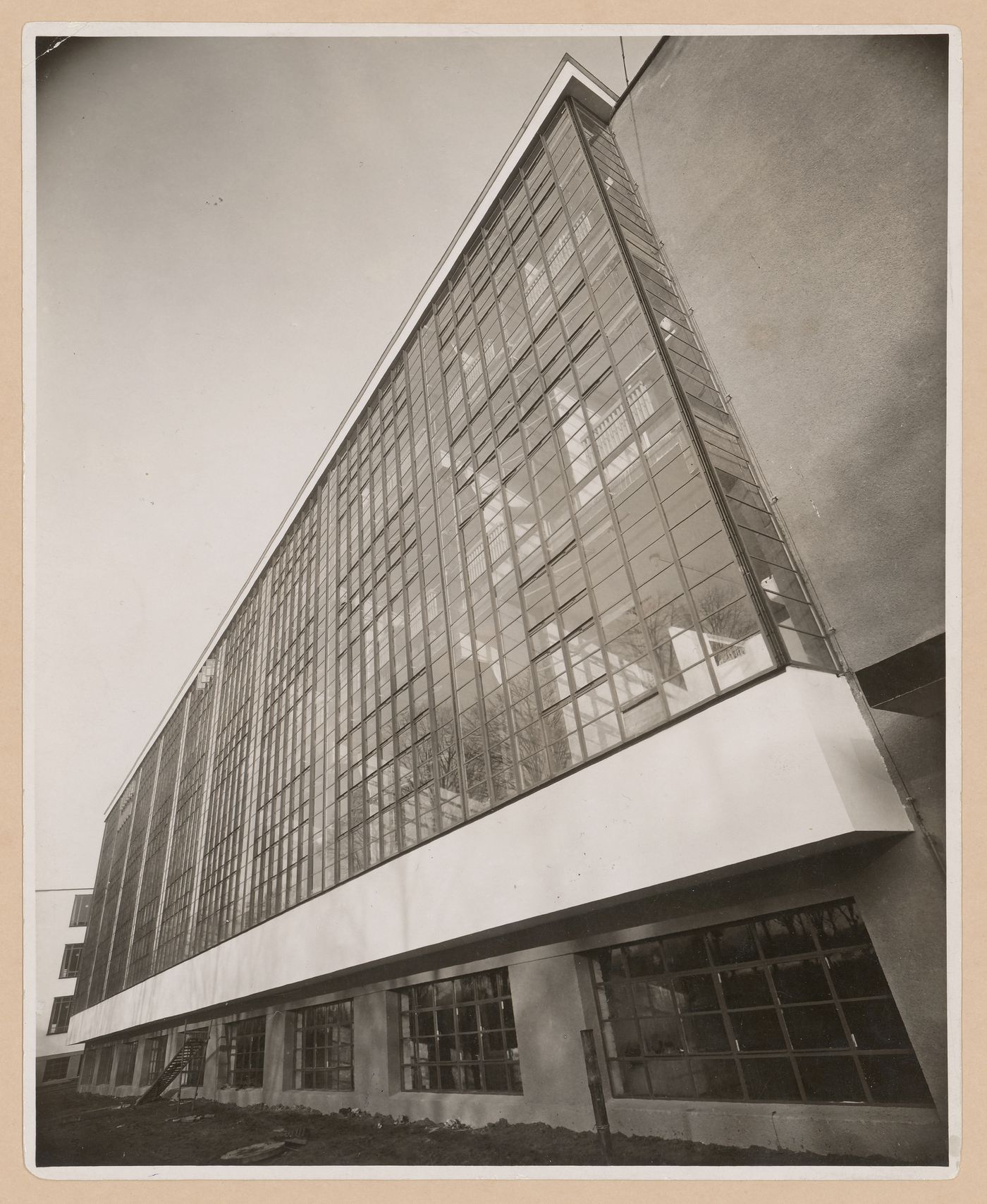 Exterior view of the workshop wing of the Bauhaus building showing a glass curtain wall, Dessau, Germany
