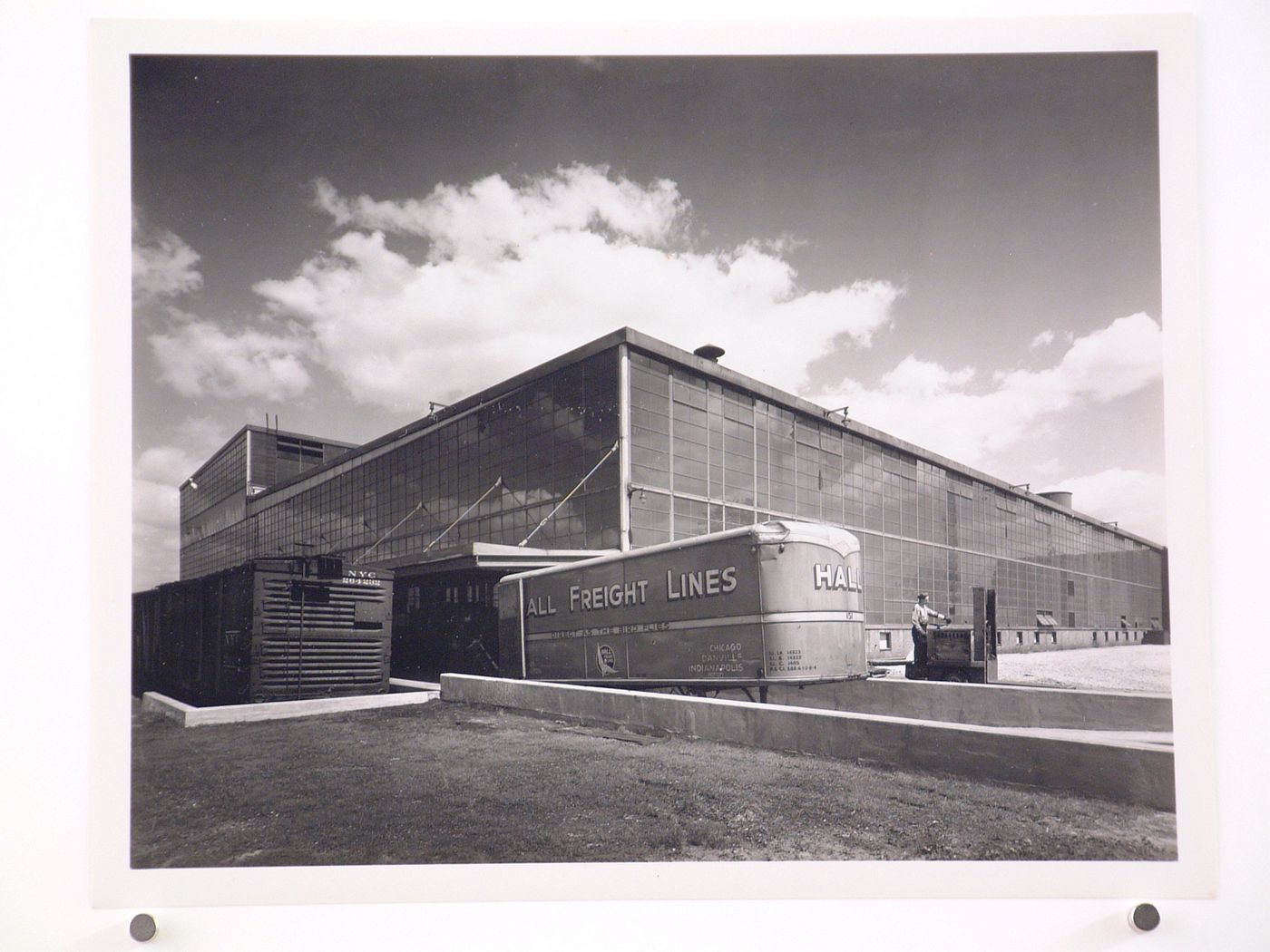 View of the south and west façades of the Shipping Department warehouse, General Motors Corporation Saginaw Malleable Iron division Assembly [?] Plant, Danville, Illinois