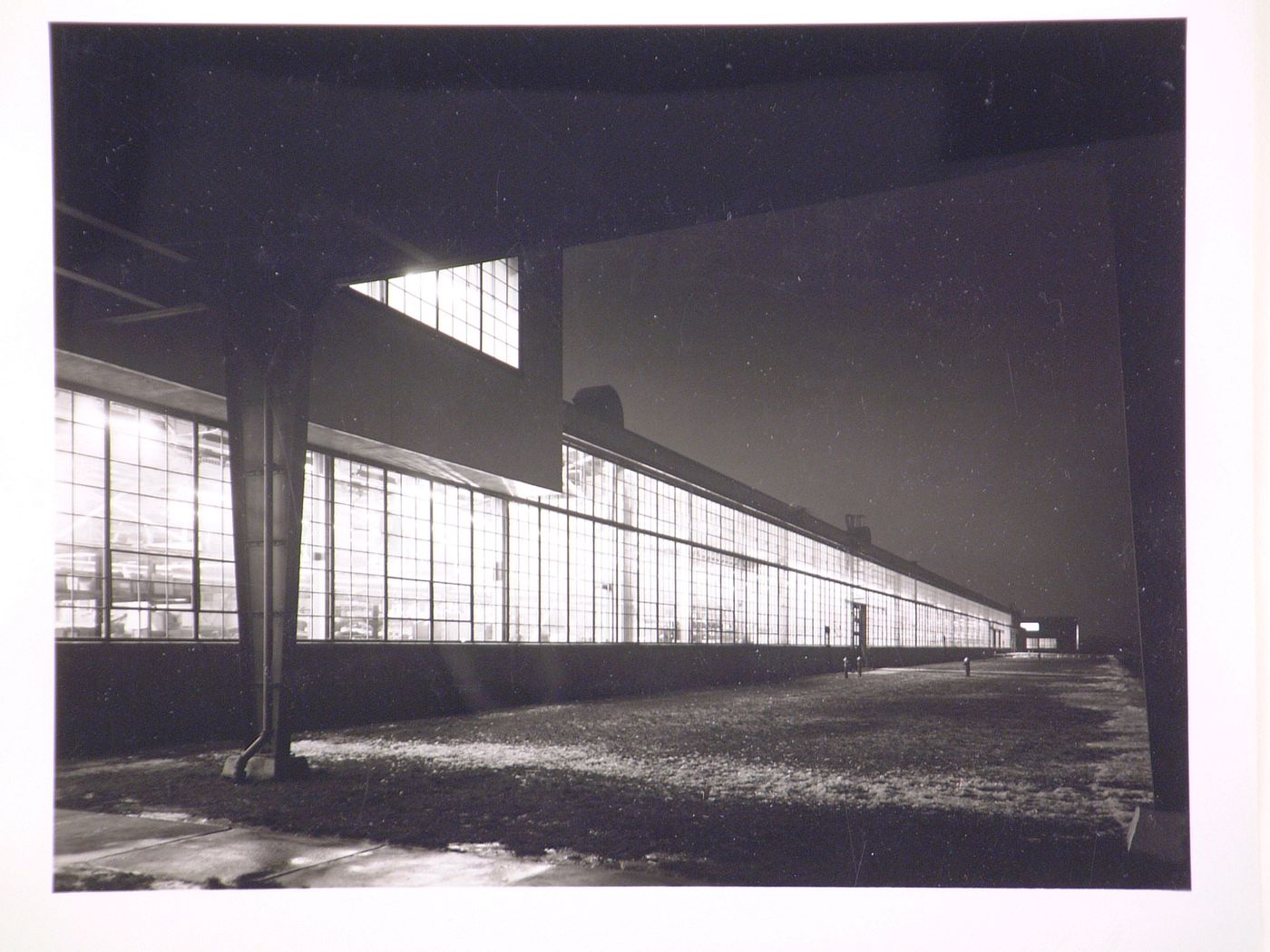 View of the north façade of the Assembly Building at night from below the skywalk, Ford Motor Company Lincoln-Mercury division Automobile Assembly Plant, Saint Louis, Missouri