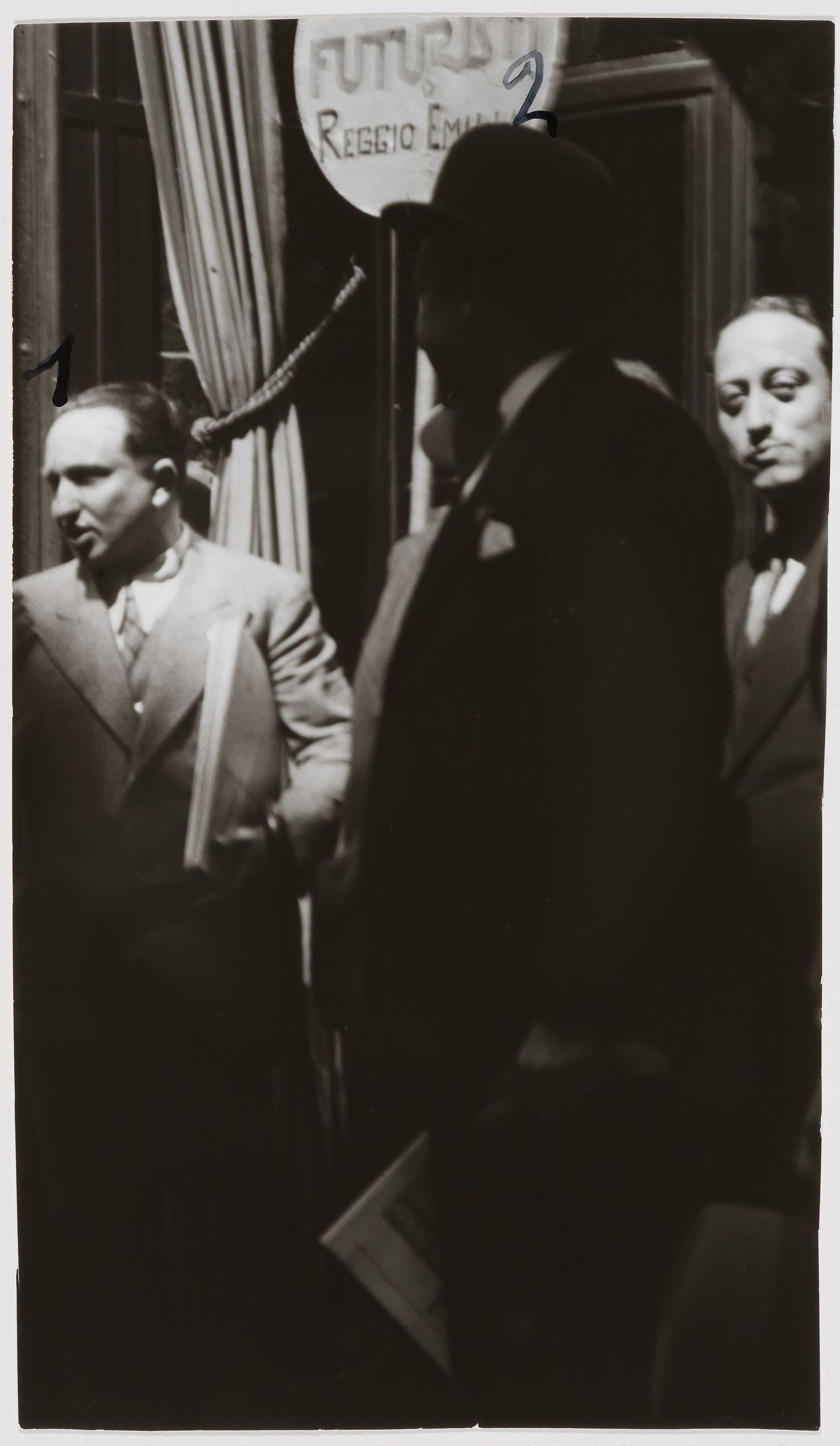 Portrait of the futurist artist Marinetti with group of men, Italy