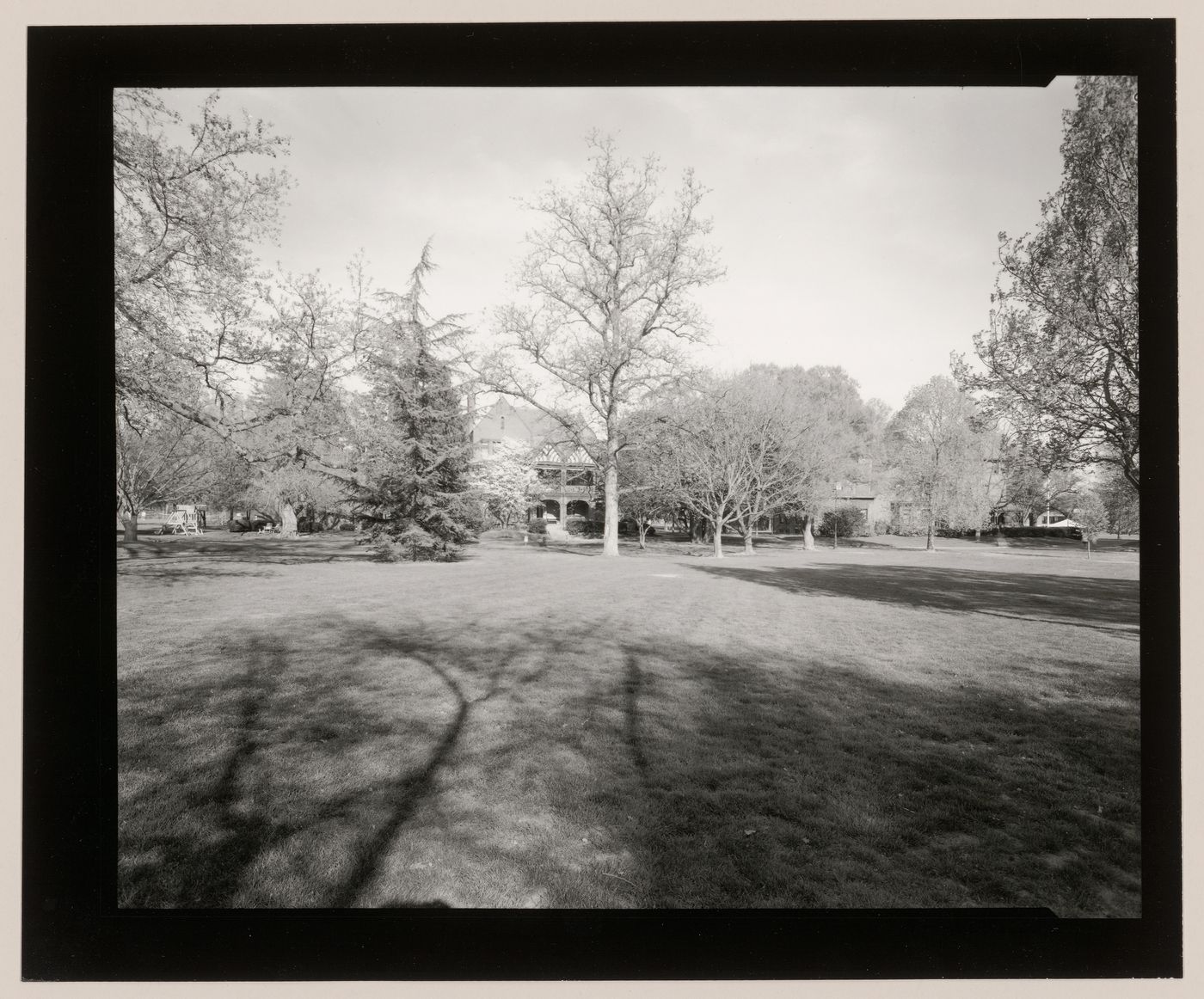 Two-part panorama of the circle with Woodhall House (left), Griswold House, Cleve House, Edith Memorial Chapel and Memorial Hall (right), Lawrenceville School, Lawrenceville, New Jersey