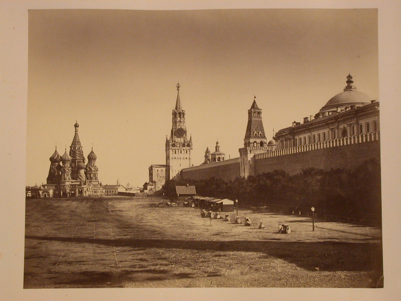 View of the Kremlin showing the Spasskaia Tower and Saint Basil Cathedral, Moscow