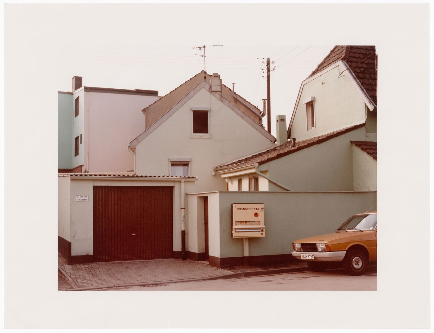 View of walled houses from street, Germany ?