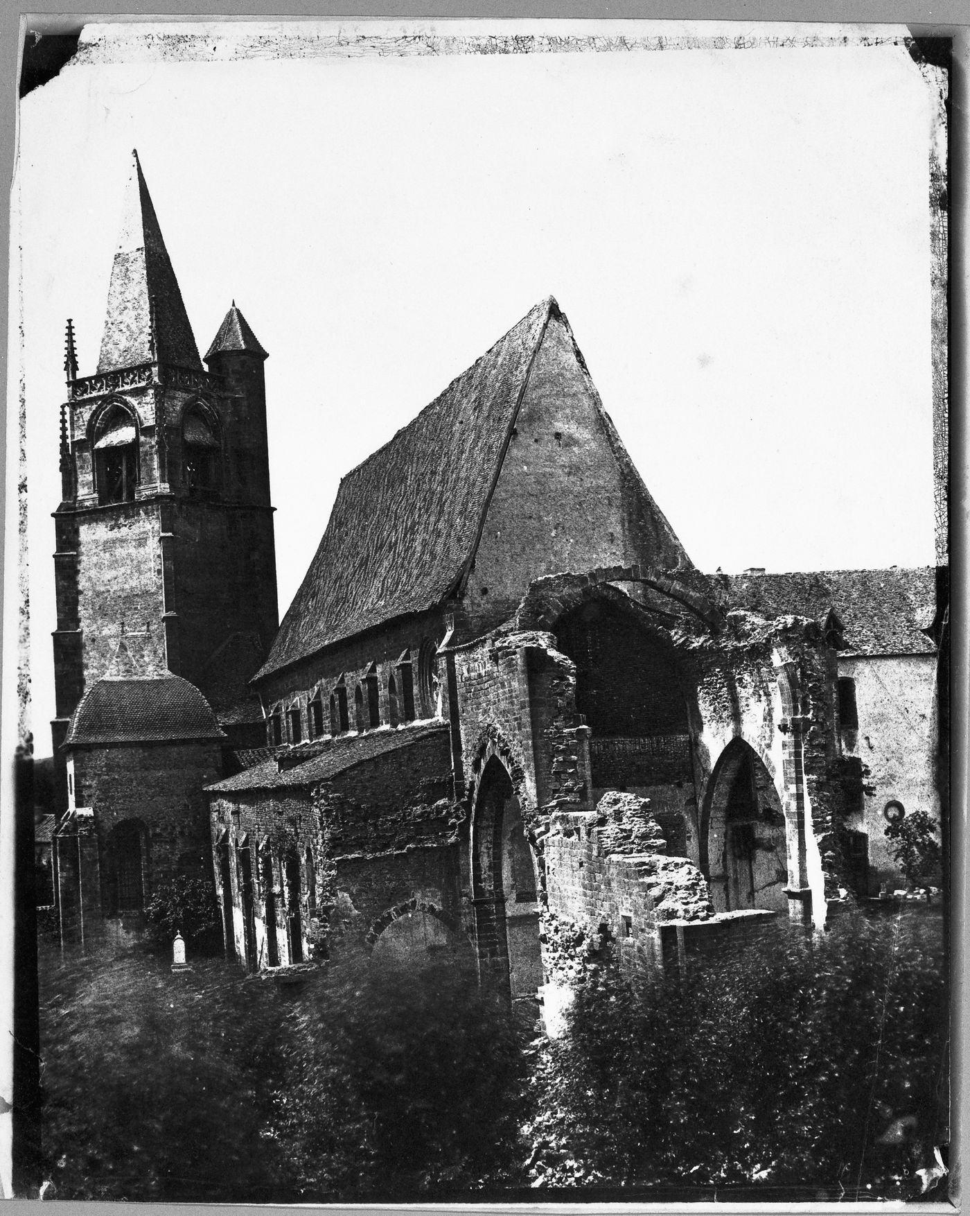 View of Church with ruined wall in foreground, Roanne, France