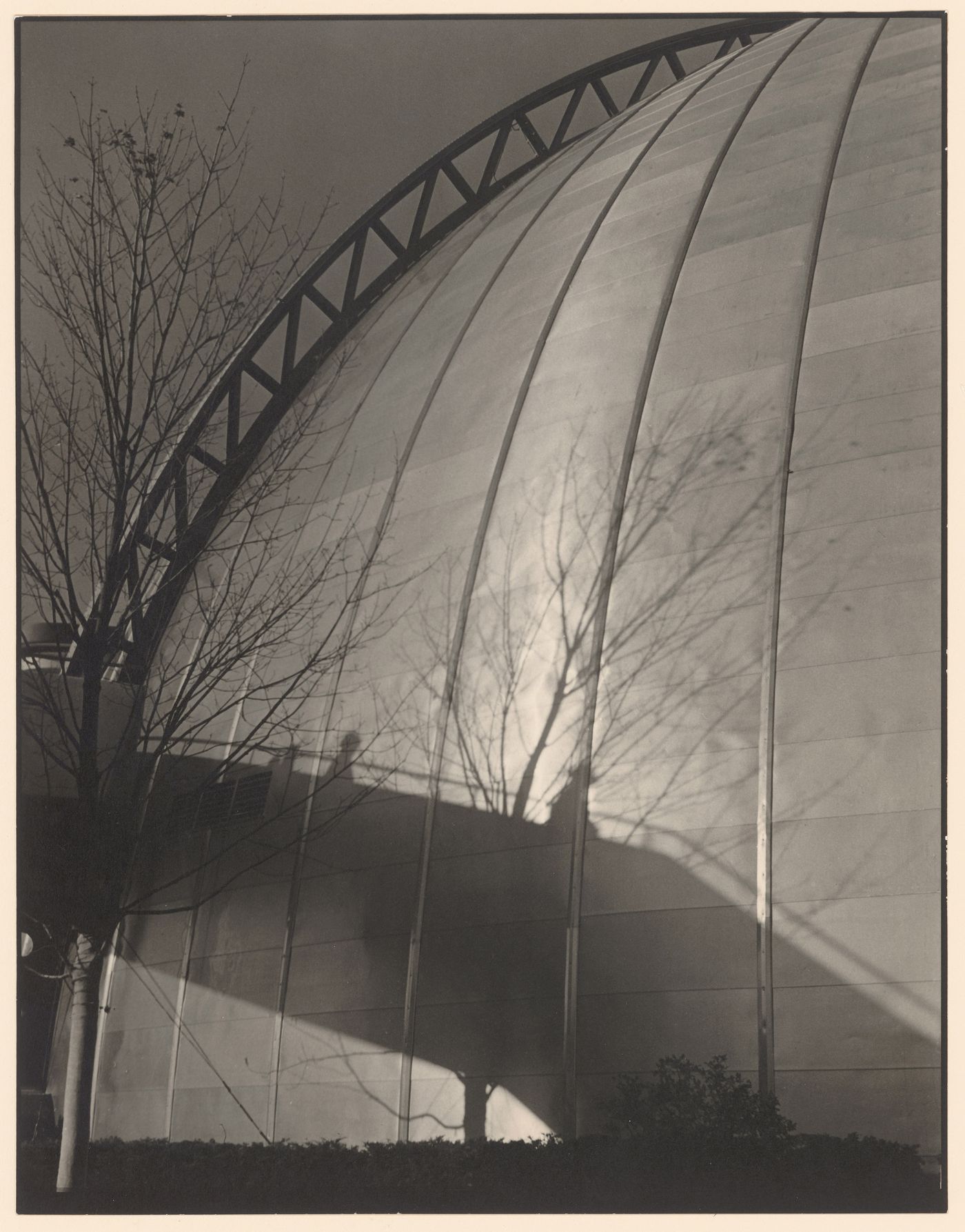 New York World's Fair (1939-1940): Partial view of U.S. Steel Building dome, with shadow of ramp two people