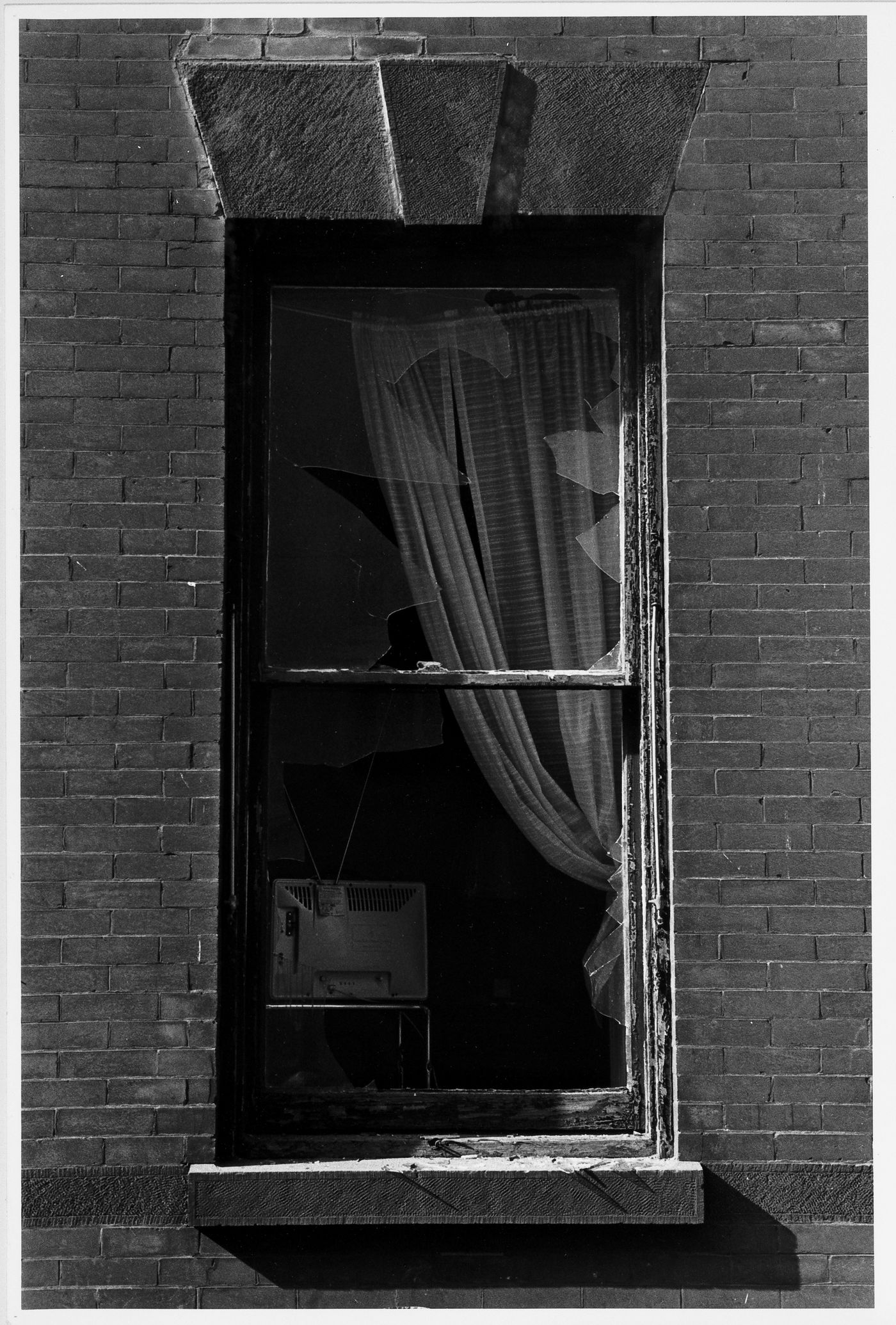 Close-up view of a broken window, New York City, New York