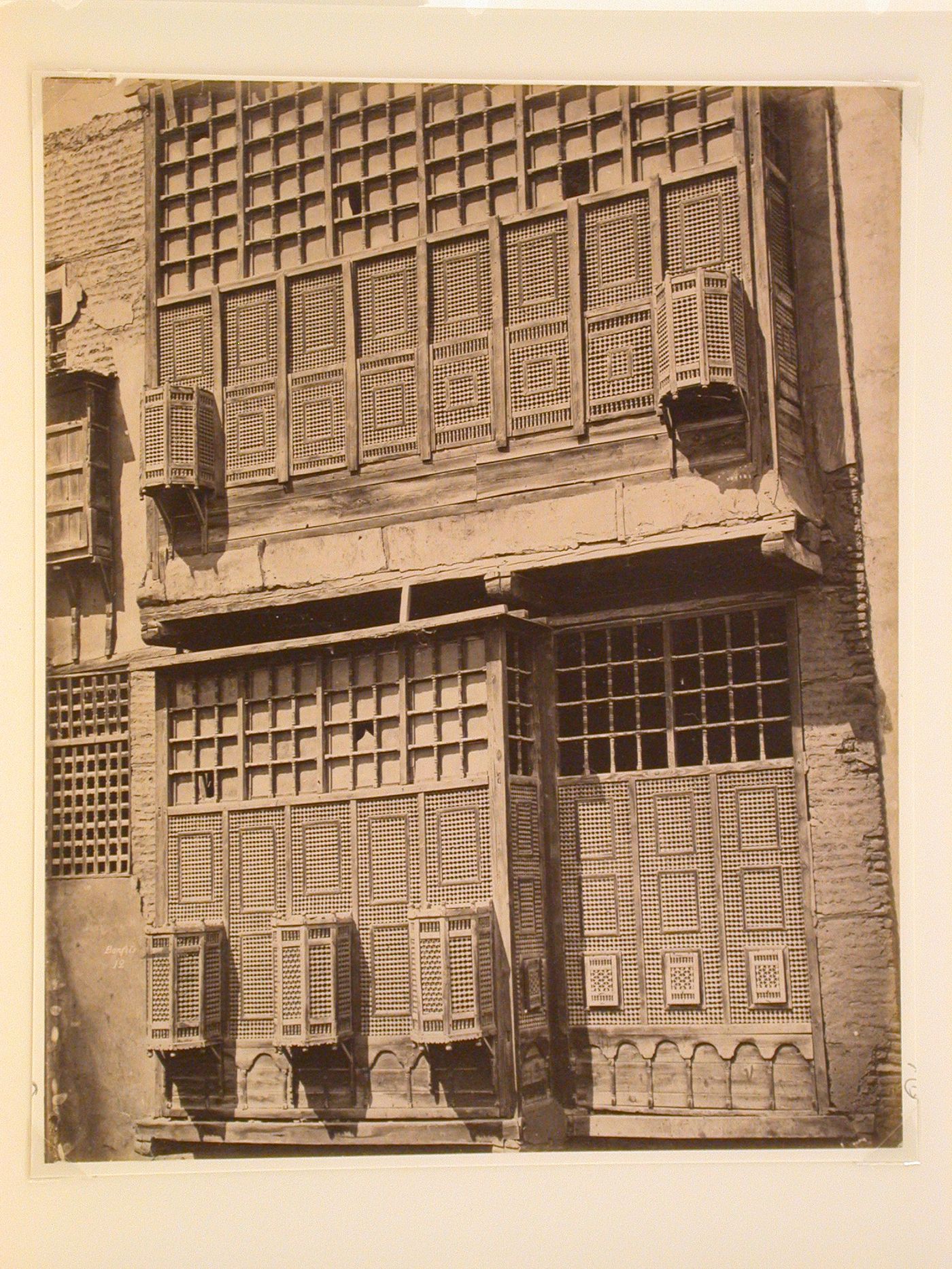 View of building façade with elaborate window screens, Cairo, Egypt