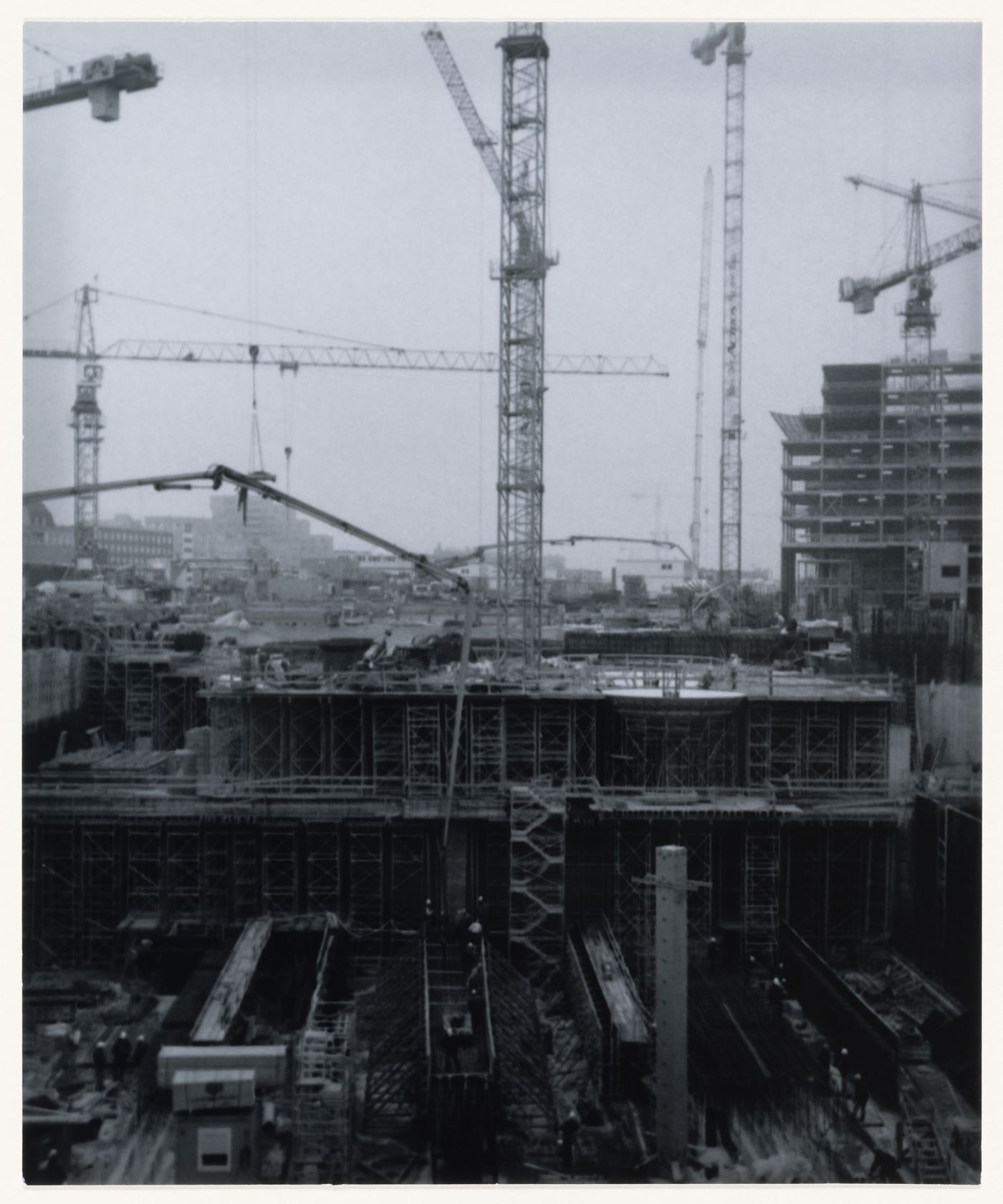 View of construction site, jib cranes and buildings, Berlin, Germany, from the artist book "The Potsdamer Project"