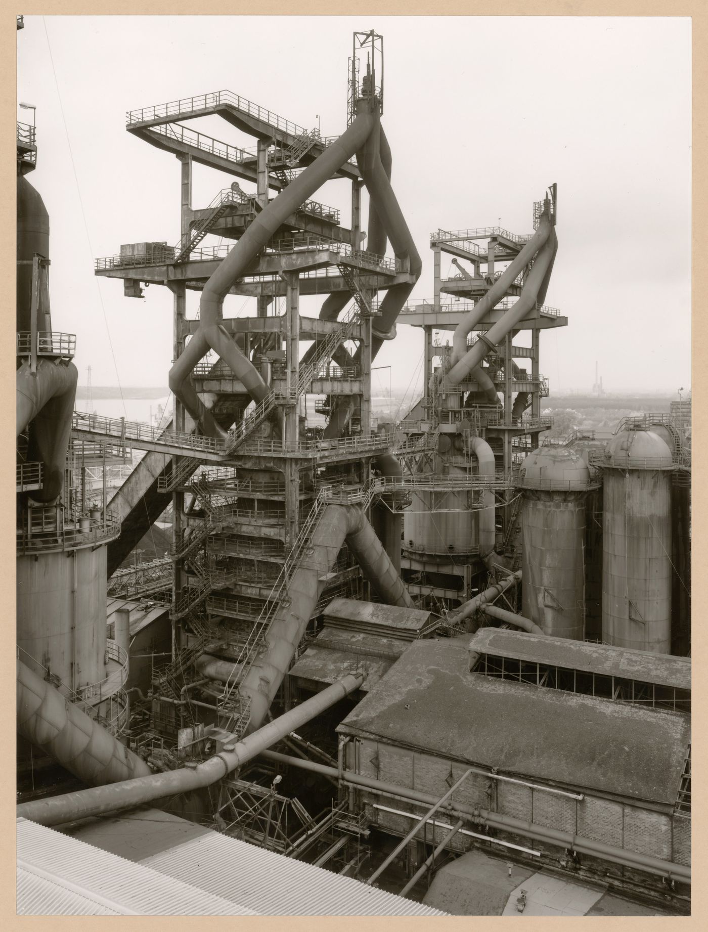 View of blast furnace heads B and A of Metallhüttenwerk industrial plant, Lübeck-Herrenwyk, Germany