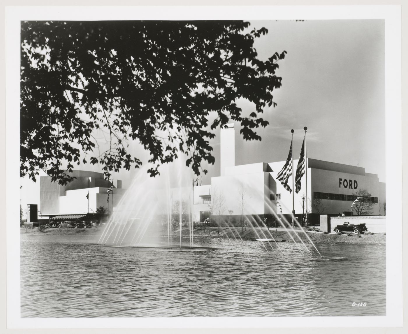 View of the Ford Motor Company pavilion with a fountain in the foreground, 1939-1940 New York World's Fair, New York City, New York