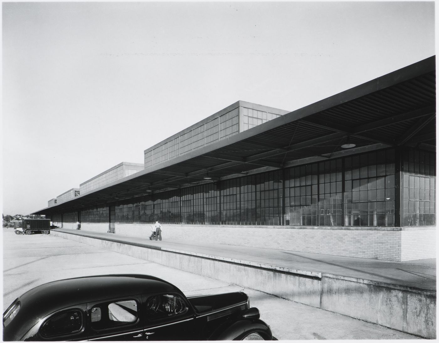 View of the rear [?] façade of a warehouse, Nash-Kelvinator Corporation Airplane Assembly [?] Plant, Plymouth, Michigan