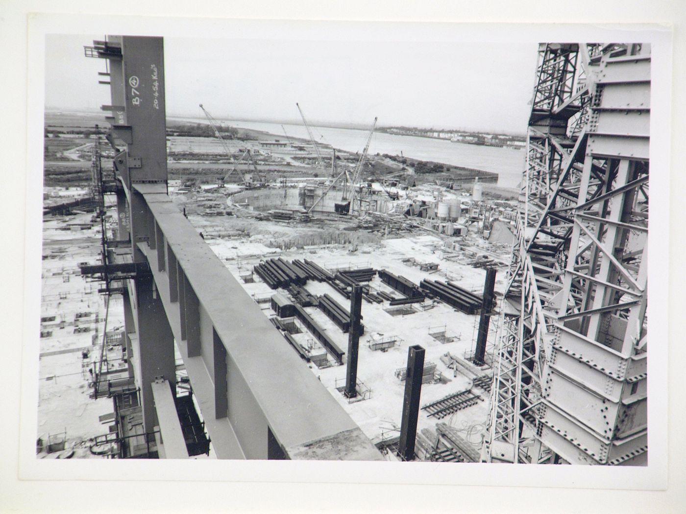 View of river and construction of power station, from above, United Kingdom