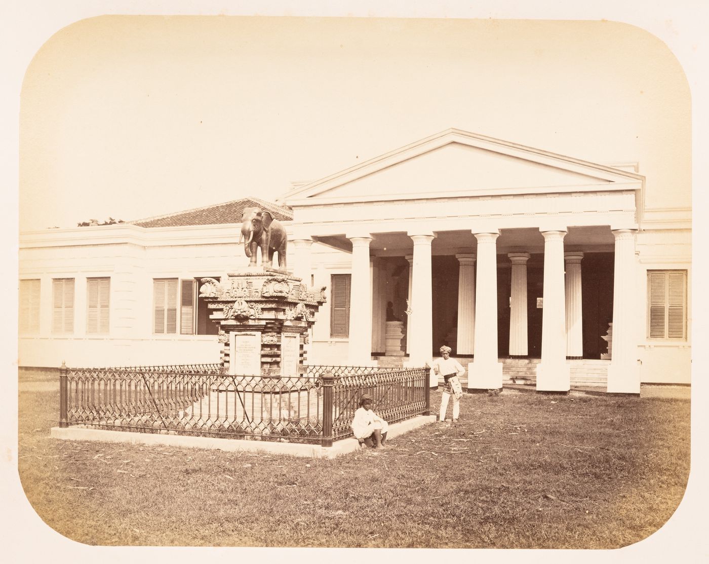 View of a statue of an elephant and the entrance to the Museum of the Batavian Society of Arts and Sciences (now the Museum Nasional), Batavia (now Jakarta), Dutch East Indies (now Indonesia)