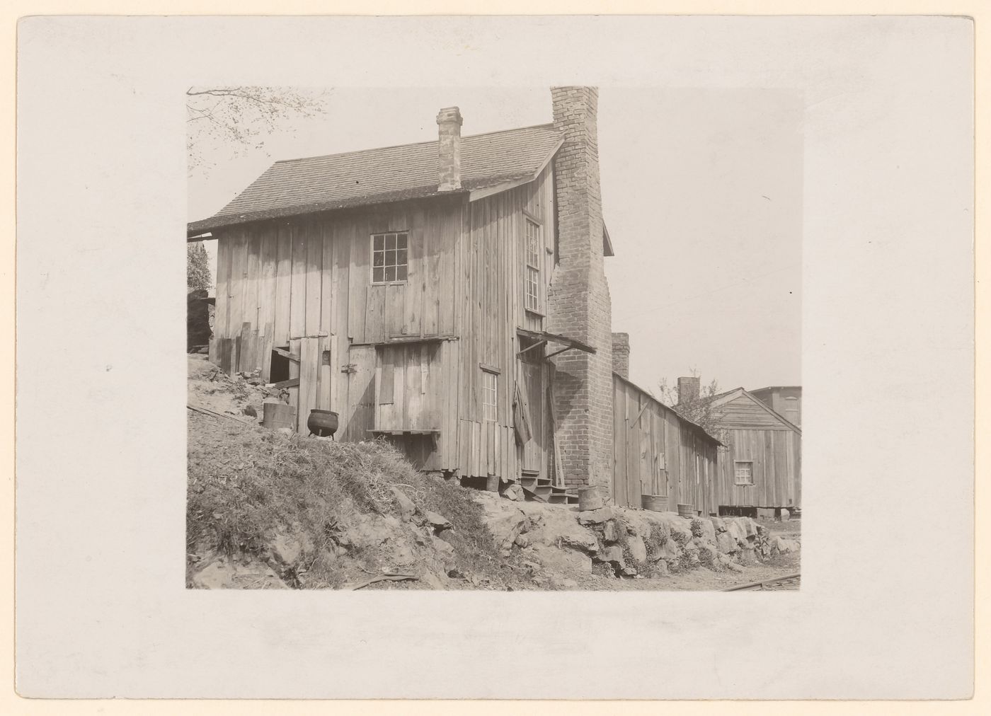 View of wooden building typically occupied by workers from Rome Hosiery Mill, Rome, Georgia, United States