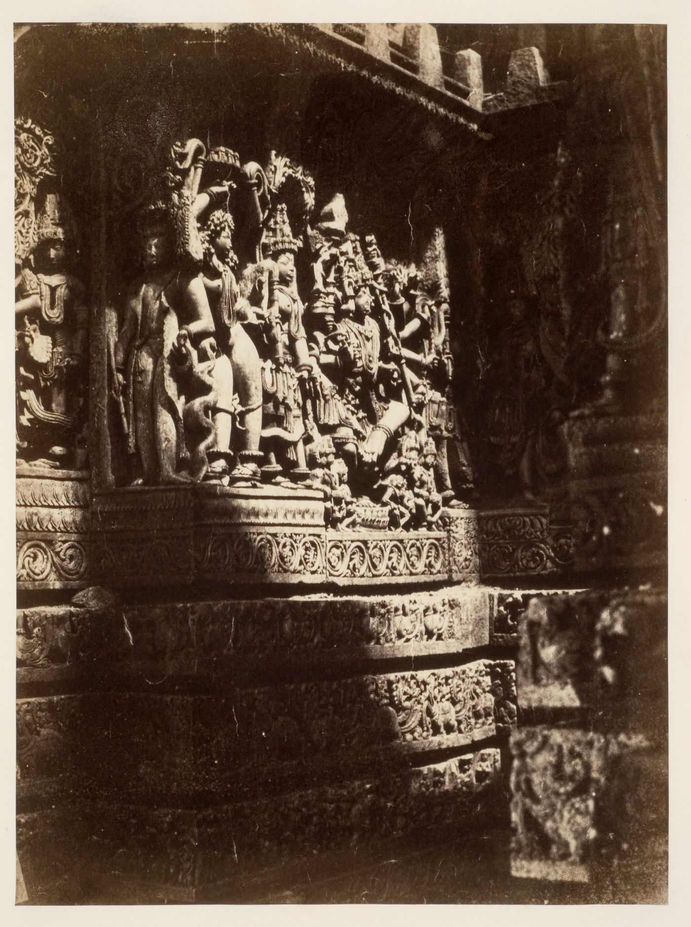 View of figures on a carved pedestal, Hoysalesvara Temple, Halebid, India