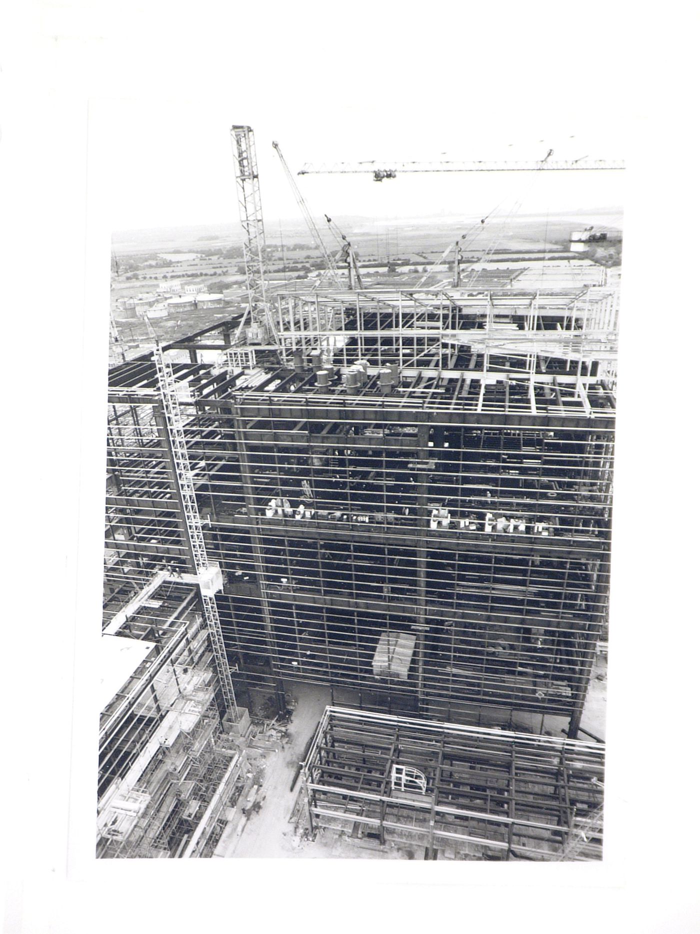 View of cranes and construction of steel structure for power station, United Kingdom