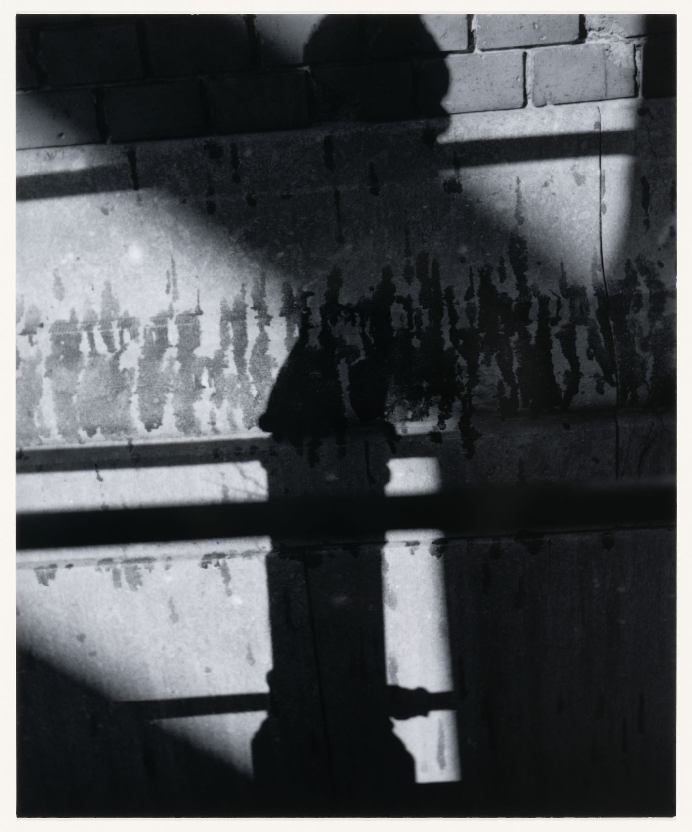 View of a wall of brick and stone showing cast shadows, Berlin, Germany, from the artist book "The Potsdamer Project"