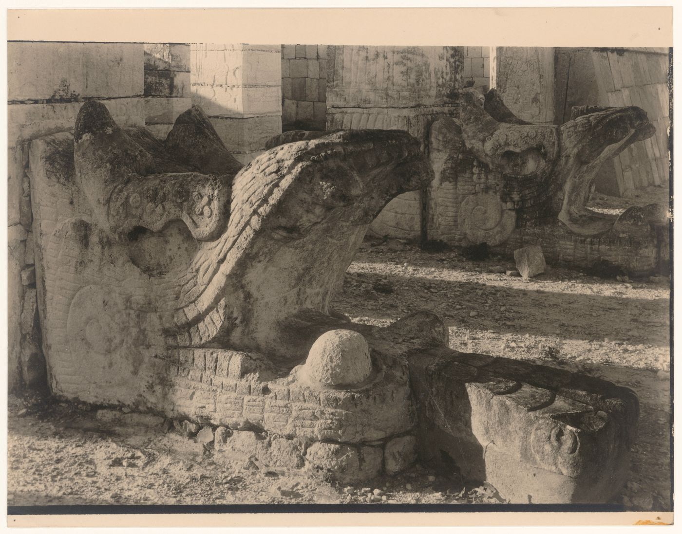 Close-up view of the sculptural bases of the Serpant Columns located at the western portal of the Temple of the Warriors, Chichén Itzá Site, Yucatán, Mexico