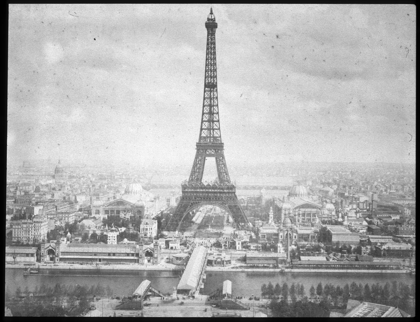 Exposition universelle de 1889 (Paris, France): Panoramic view of Eiffel Tower and exposition grounds across river