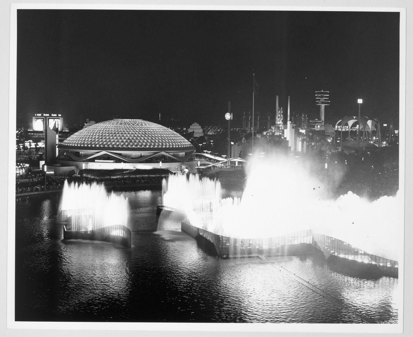 General view of the General Electric Attraction Building at night, World's Fair, New York, New York, United States