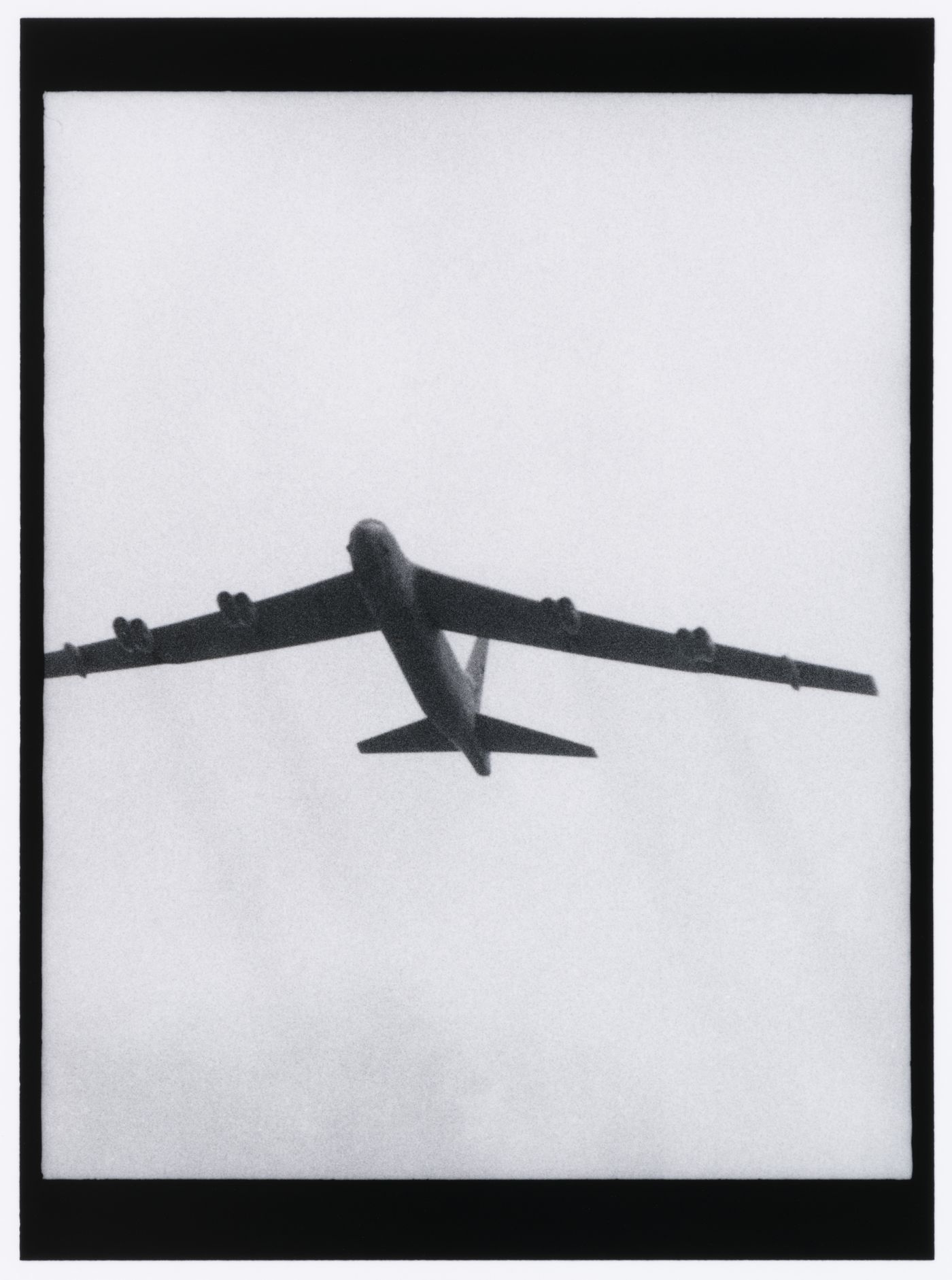 View of a Boeing B52 strategic bomber in flight, Washington D.C., United States, from the series "Empire"