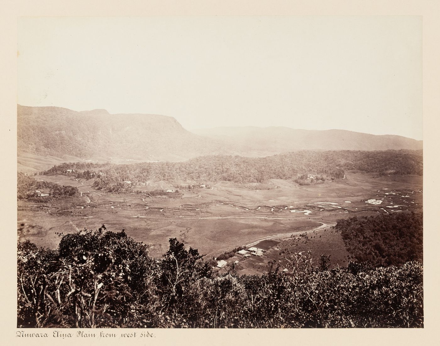 View of the Nuwara Eliya Plain from the west side, Nuwara Eliya, Ceylon (now Sri Lanka)