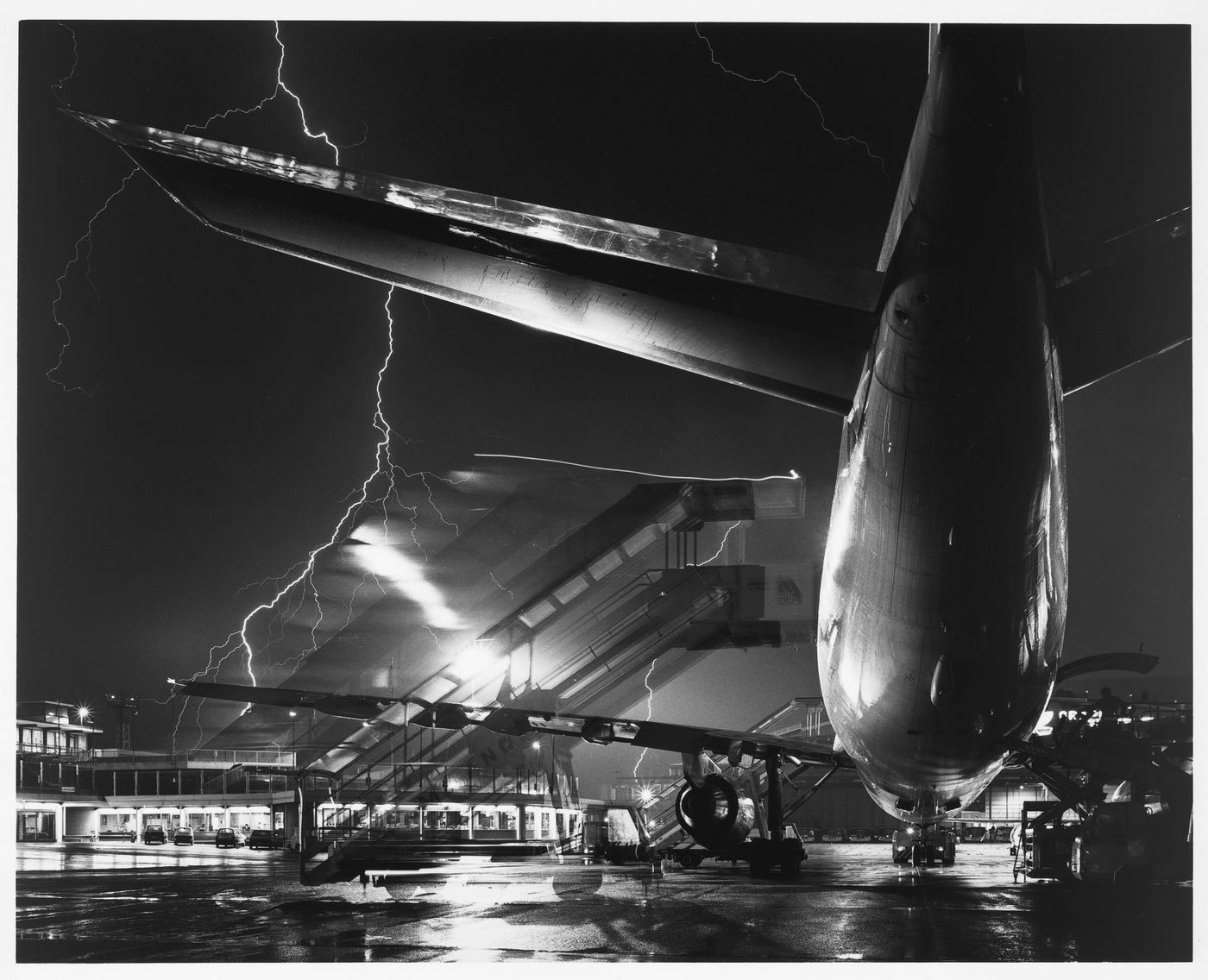 Night view of the Airport during a thunder storm, Milan, Italy