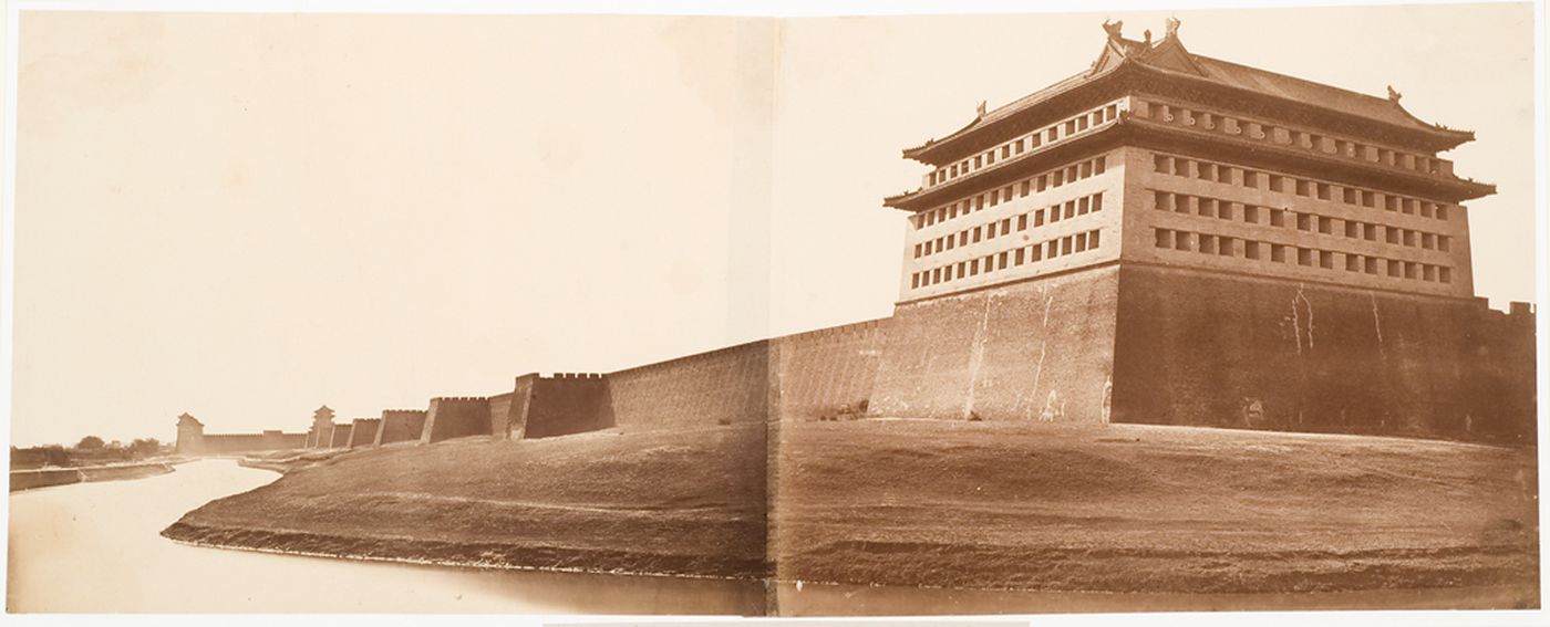 View of the northeast corner watchtower and walls of the Inner City, Peking (now Beijing), China