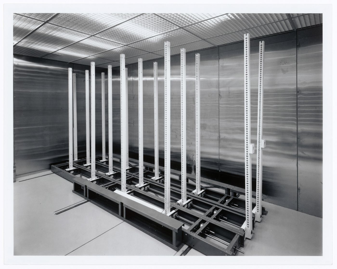 Interior view of the Photographs Collection storage vault on level 2 showing partially installed storage racks, Canadian Centre for Architecture under construction, Montréal, Québec