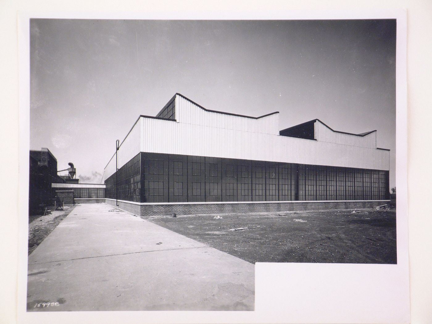 View of the principal and lateral façades of the Stack Shop and Storage Building, Curtiss-Wright Corporation Airplane division Assembly Plant [?], Buffalo, New York