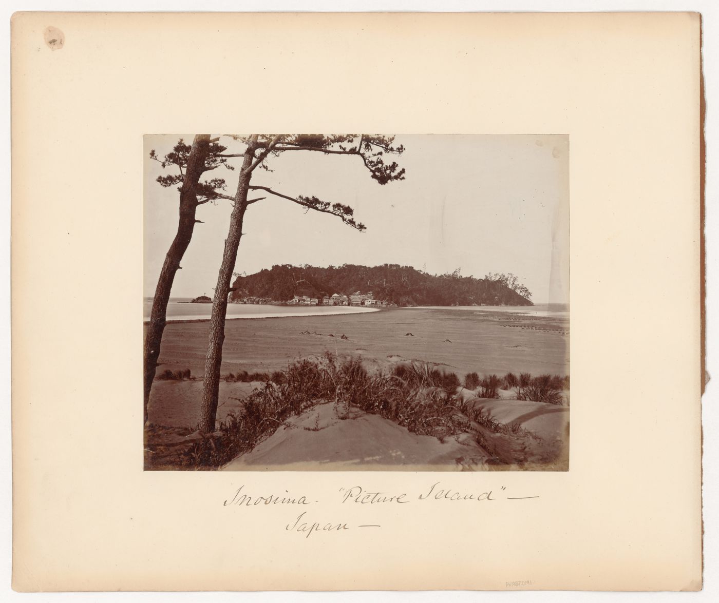 View of Eno Island (also known as Picture Island) showing the isthmus and a town, Kanagawa-ken, Japan