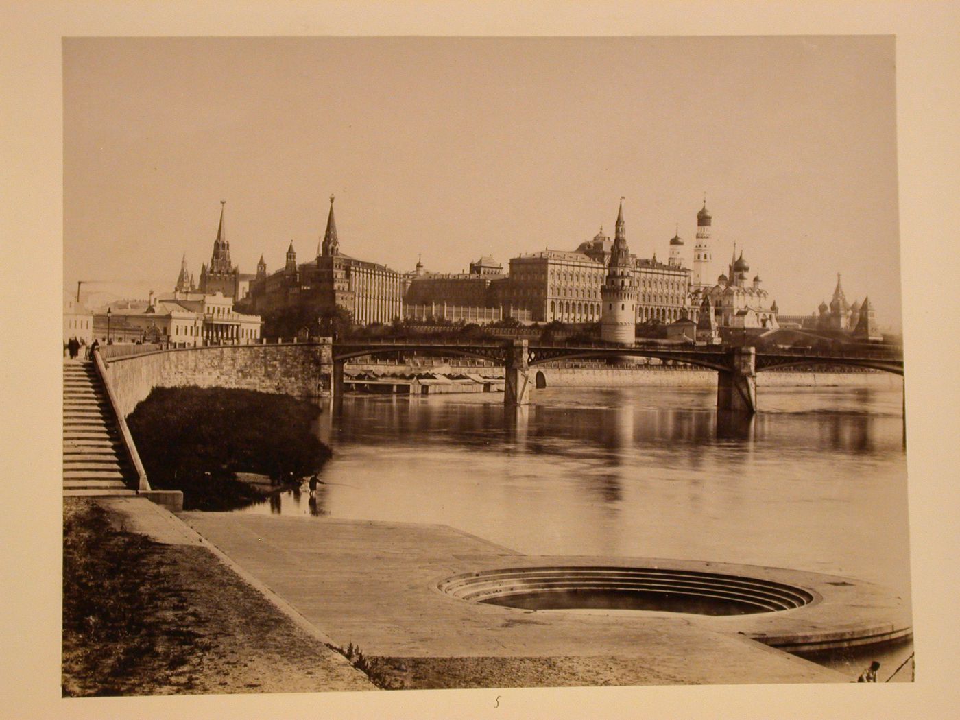 View of the Kremlin from across the Moskva River showing the Borovitski Tower and Vodovzvodnaya Tower (Water-pumping Tower) in the foreground, Moscow