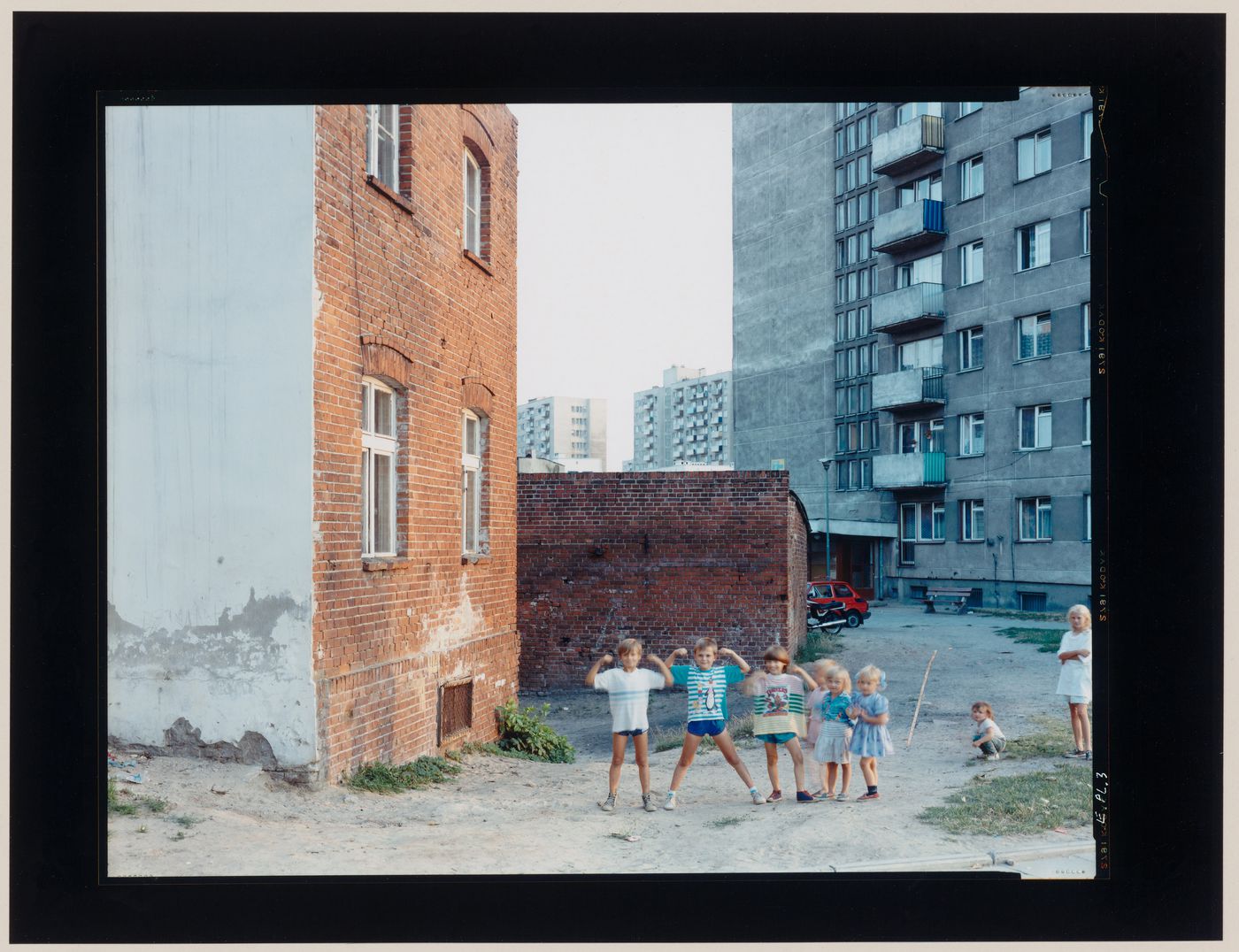 View of apartment houses and children, Malbork, Poland (from the series "In between cities")