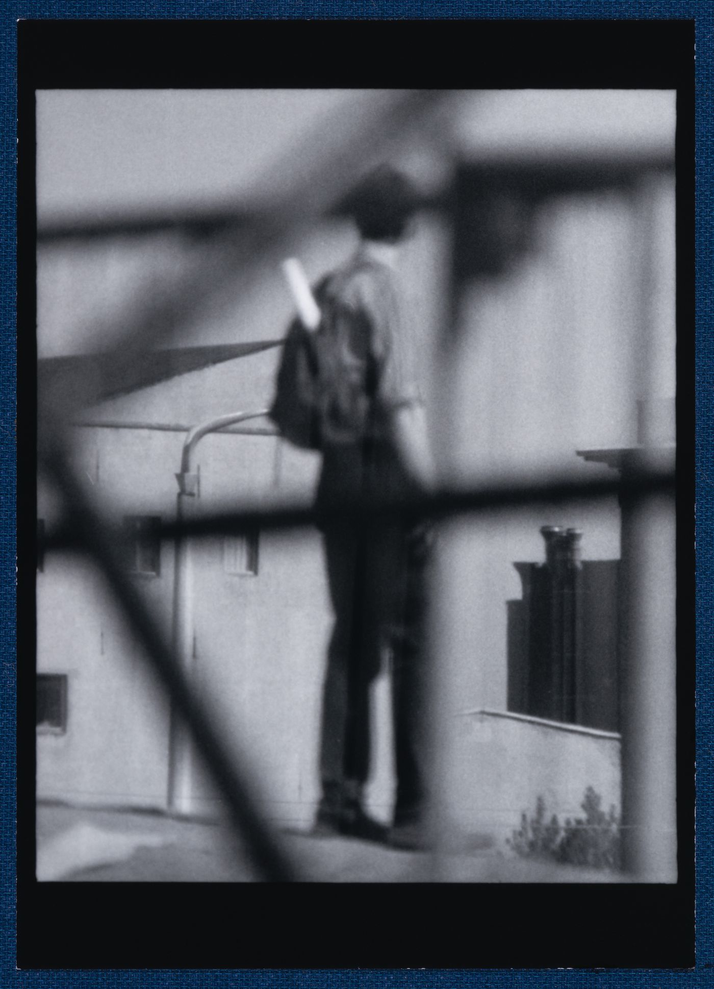 View of a man, walls and cast shadows, Berlin, Germany, from the artist book "The Potsdamer Project"