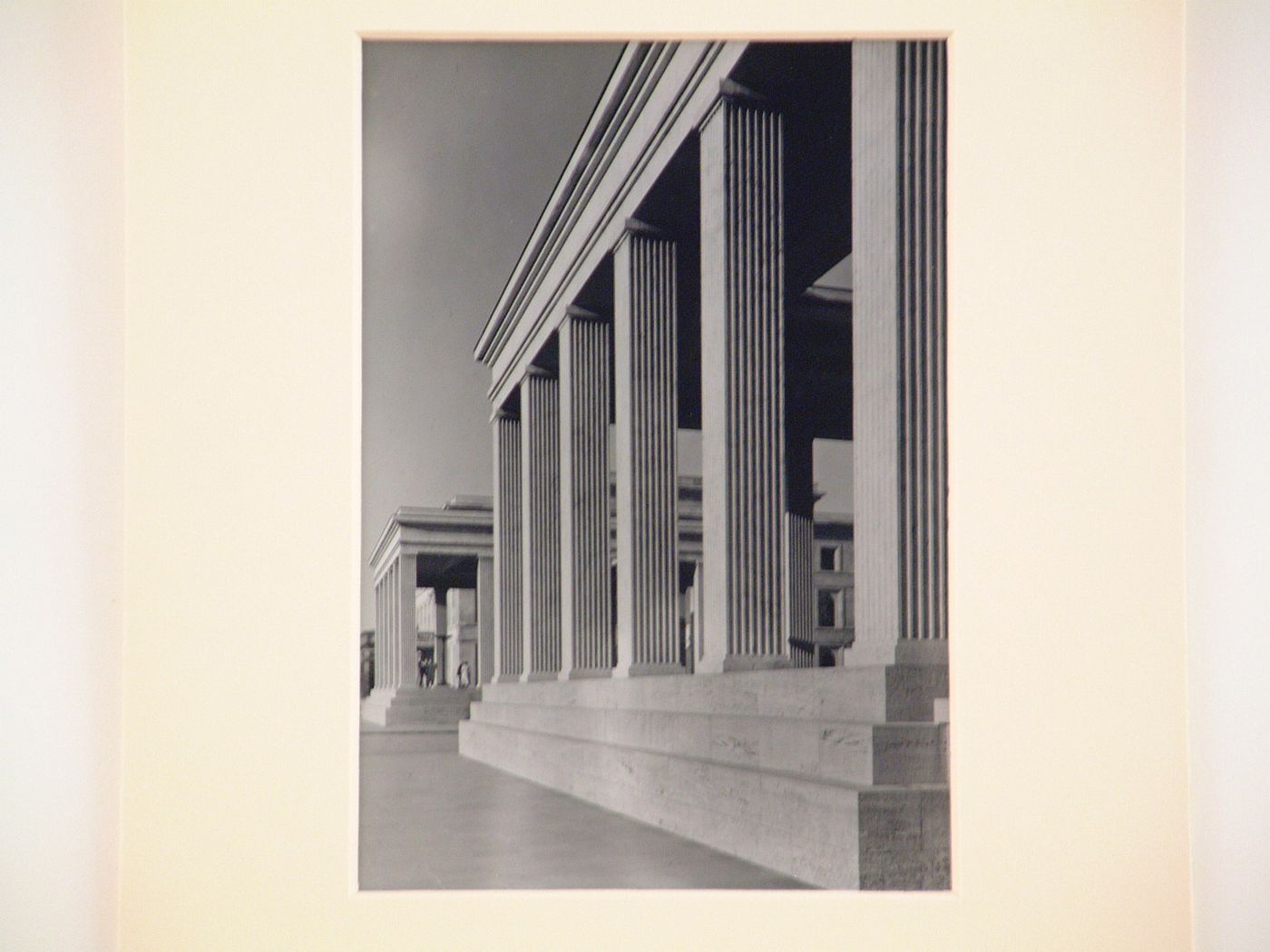 Porticos of large neoclassical building seen from sharp angle, Munich, Germany