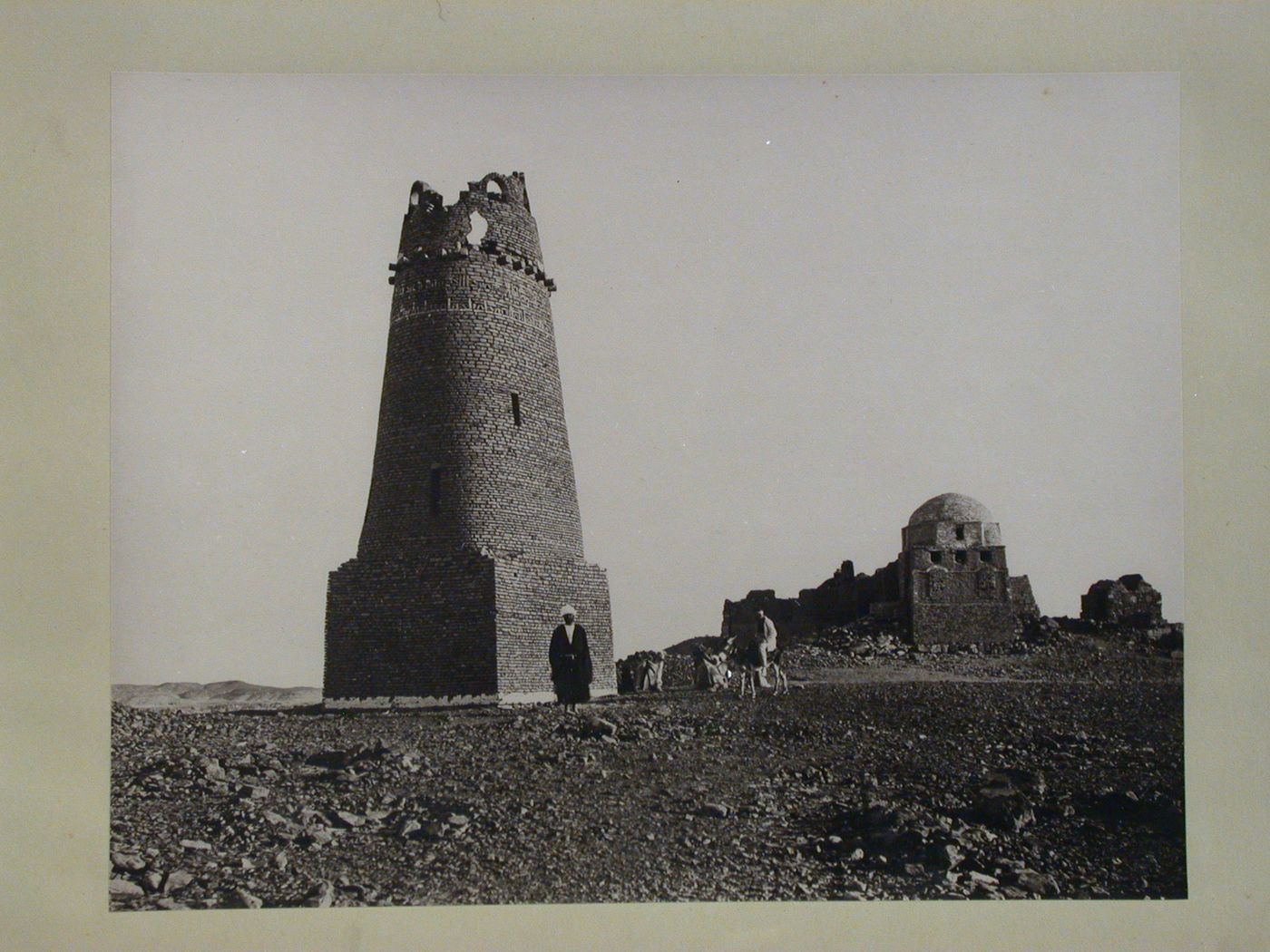 Ruins of minaret and mosque on hill above Muslim cemetery, Aswan, Egypt