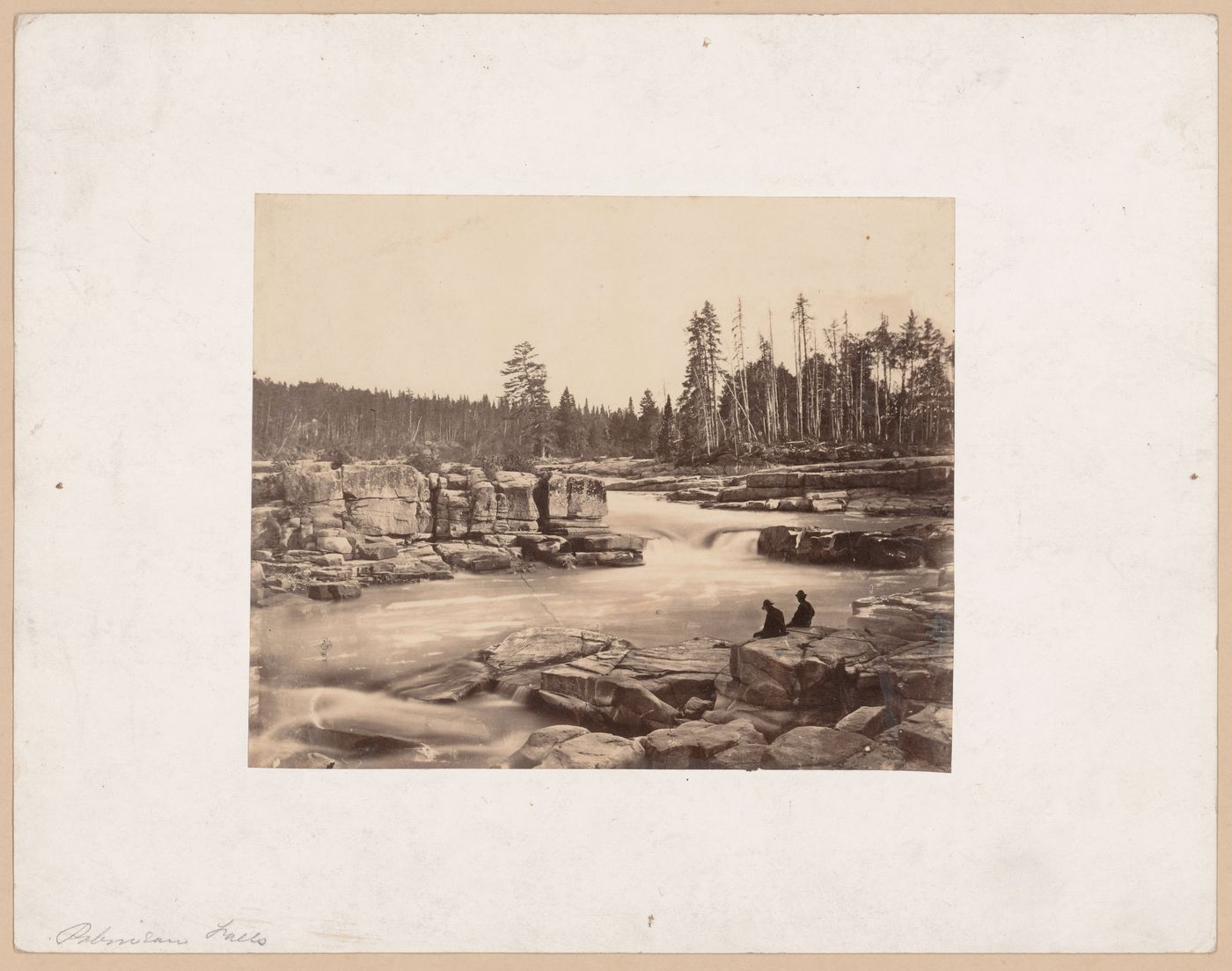 View of two men sitting on rocks at the edge of Robinson Falls, Saint John River [?], New Brunswick [?]