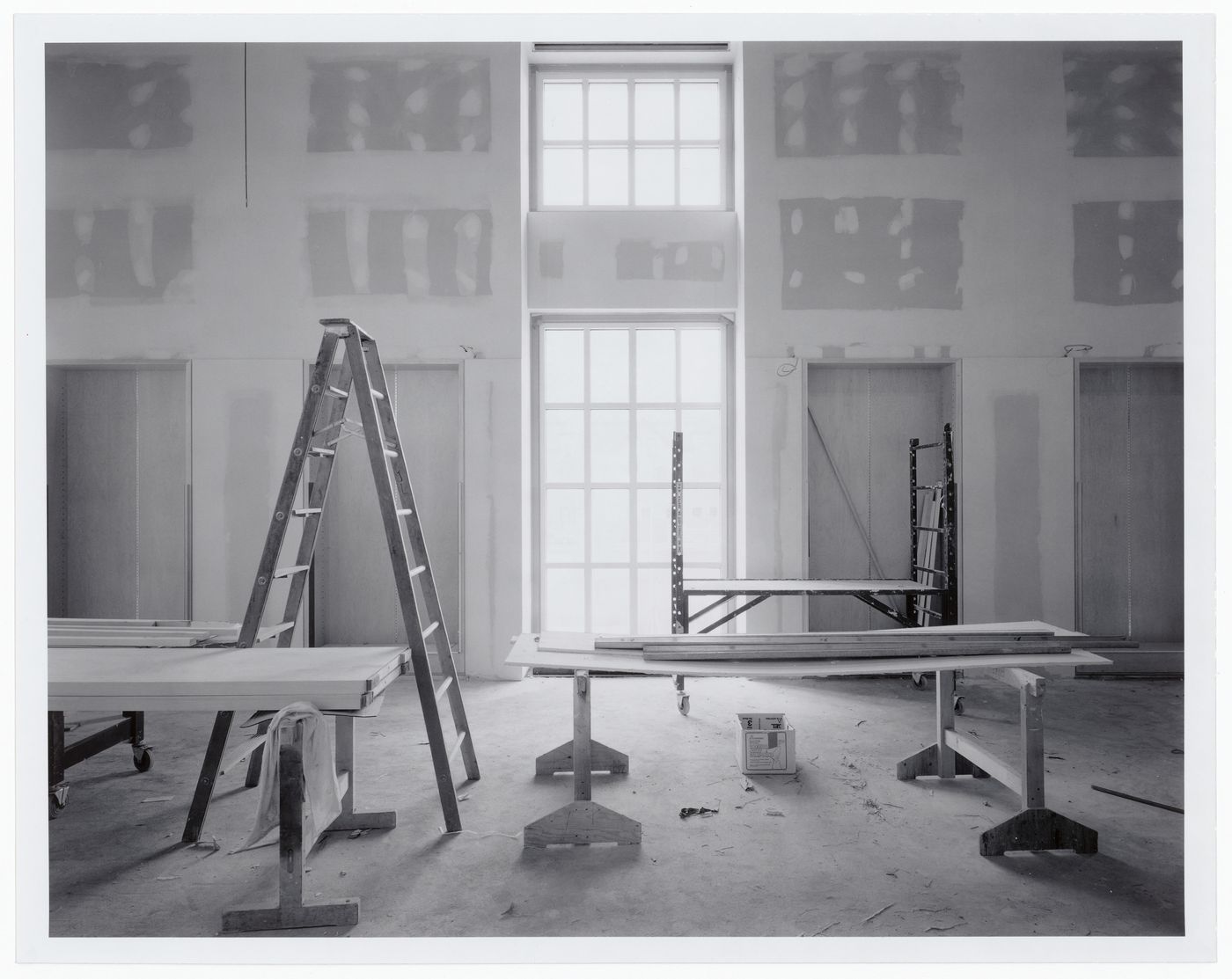 Interior view of the Alcan Wing [?] showing a ladder, work tables, and a window, Canadian Centre for Architecture under construction, Montréal, Québec