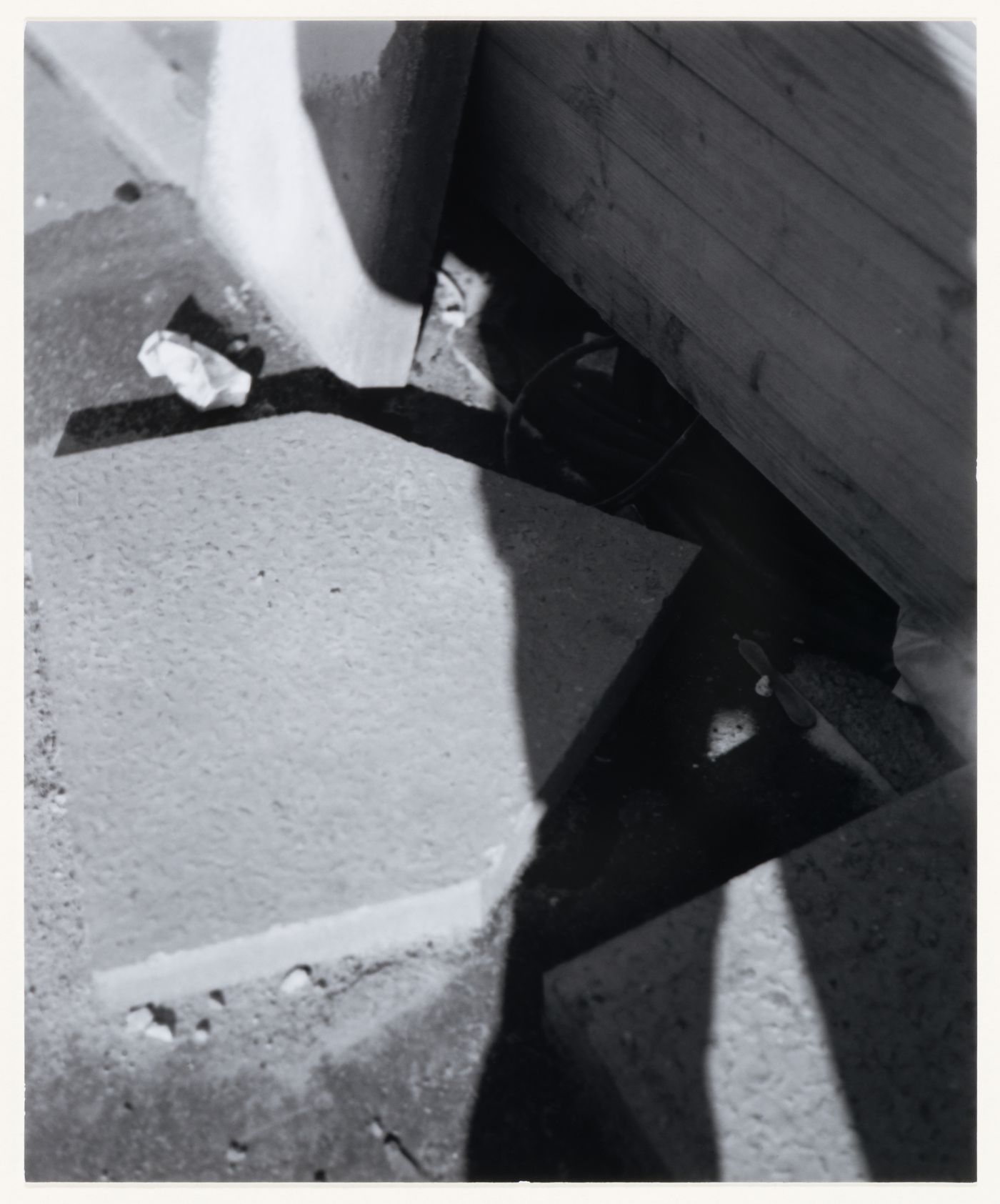 View of concrete paving tiles, wood and cast shadows, Berlin, Germany, from the artist book "The Potsdamer Project"