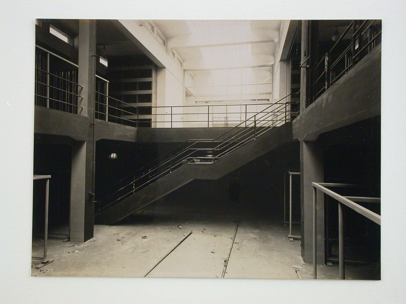 Interior view of inspections agency for electrical works showing stairway between two floors open to the ceiling, Frankfurt am Main, Germany