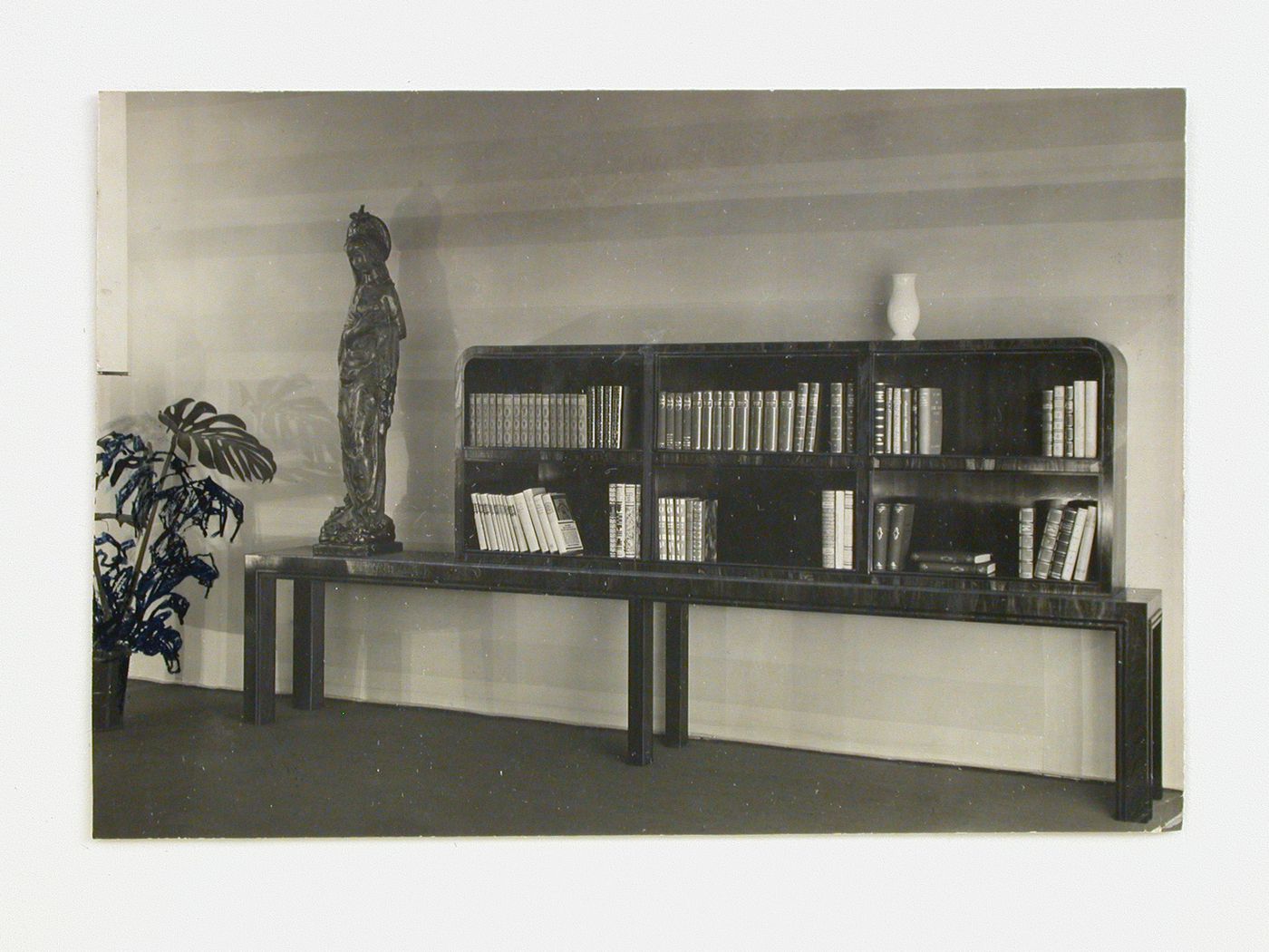 Interior view of bookcase from the exhibition "Raum Kunst", Dusseldorf, Germany