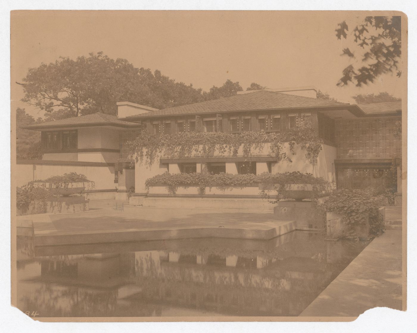 Exterior view of Coonley House from the pool, Riverside, Illinois